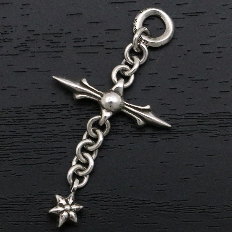 image of Chrome Hearts Rollie Cross Charm Pendant in Silver, Women's