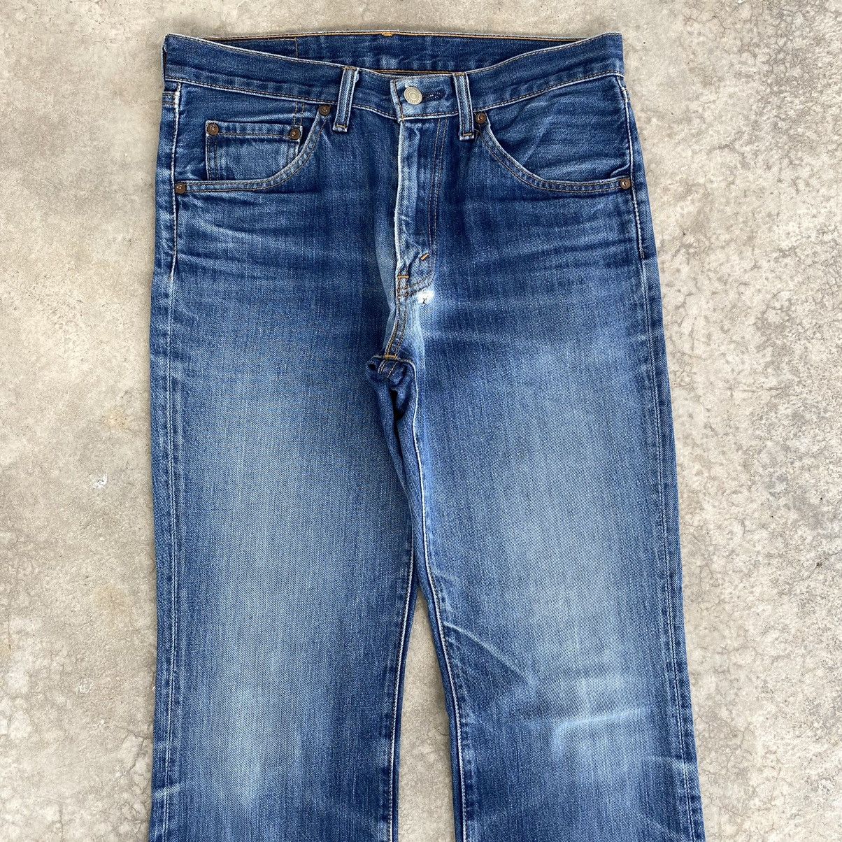 image of Distressed Denim x Levis Vintage Levis 517 Faded Indigo Flared Denim Jeans in Faded Blue (Size 32)