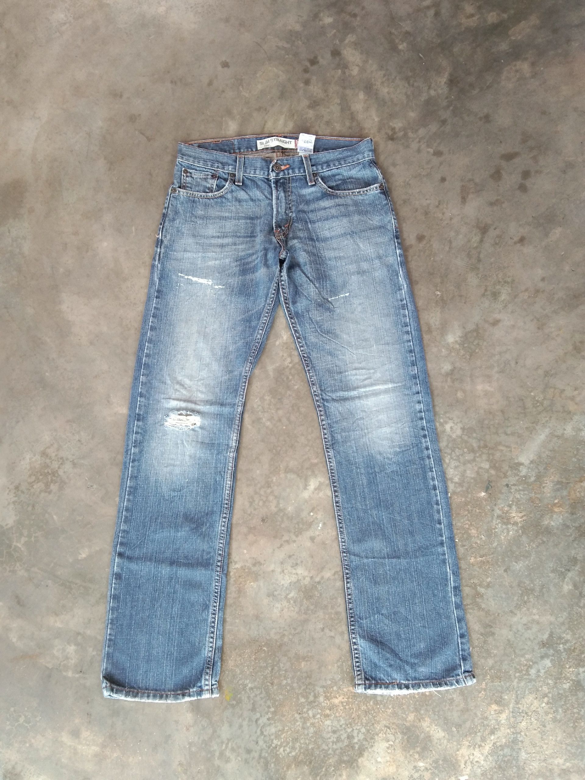 image of Vintage Levi's Jeans 514 Slim Straight Fit Distressed Denim in Blue, Men's (Size 29)