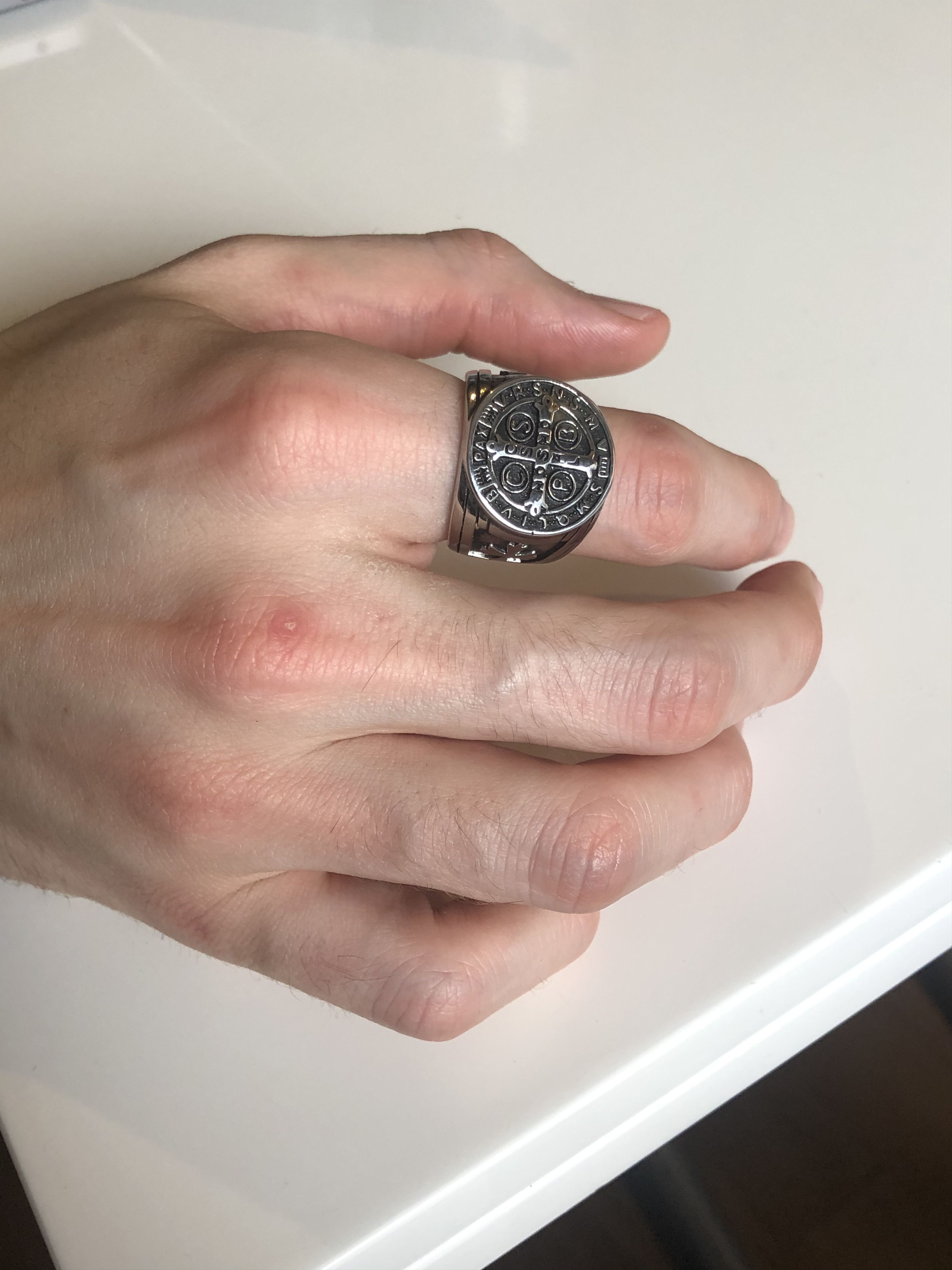 silver signet ring & adorned with its cross
