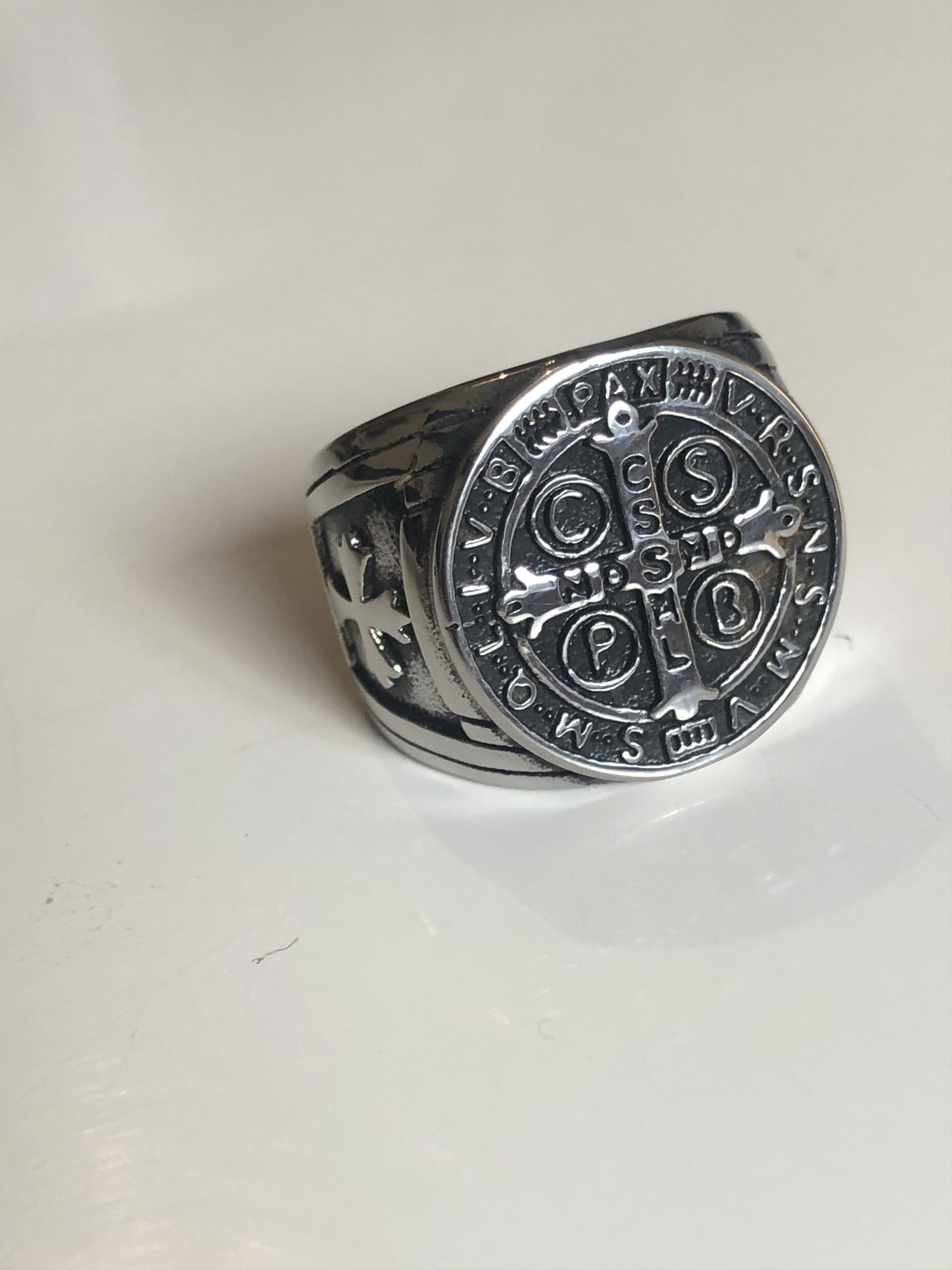 silver signet ring & adorned with its cross