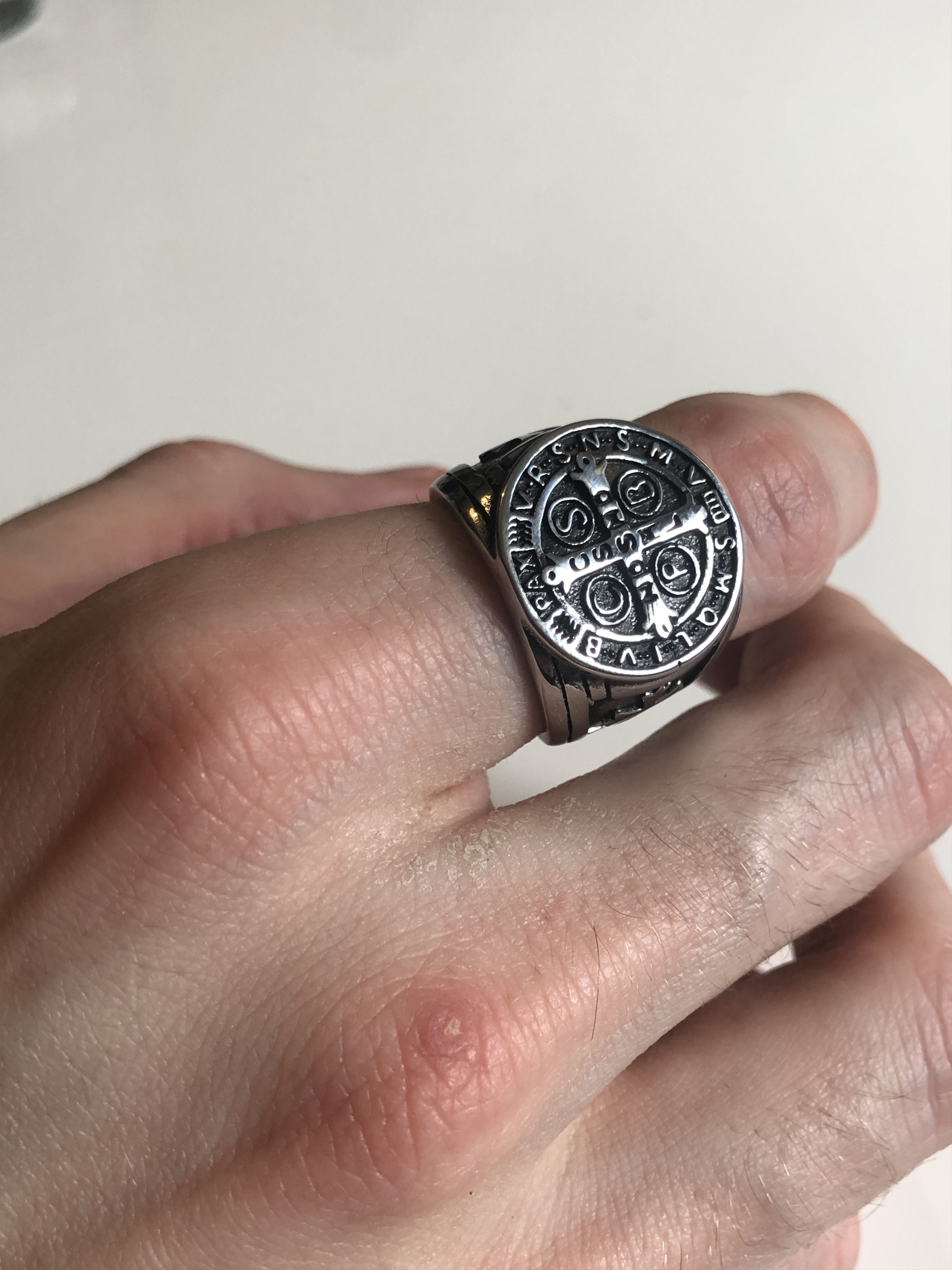 silver signet ring & adorned with its cross