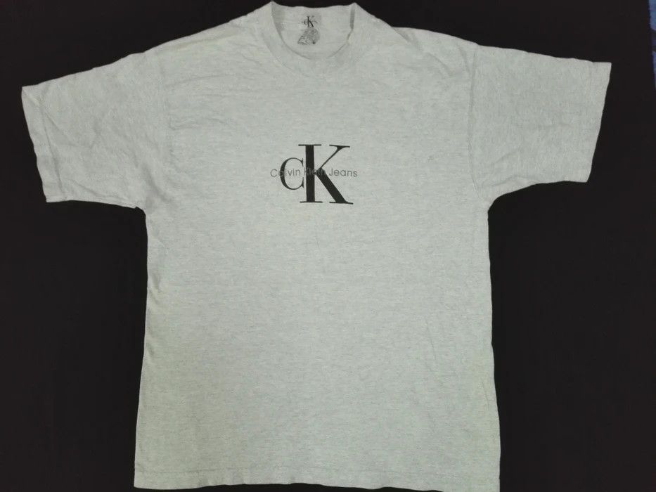 image of Vintage 90's Ck Calvin Klein Jeans Spell Out Logo T Shirt in Grey, Men's (Size Large)