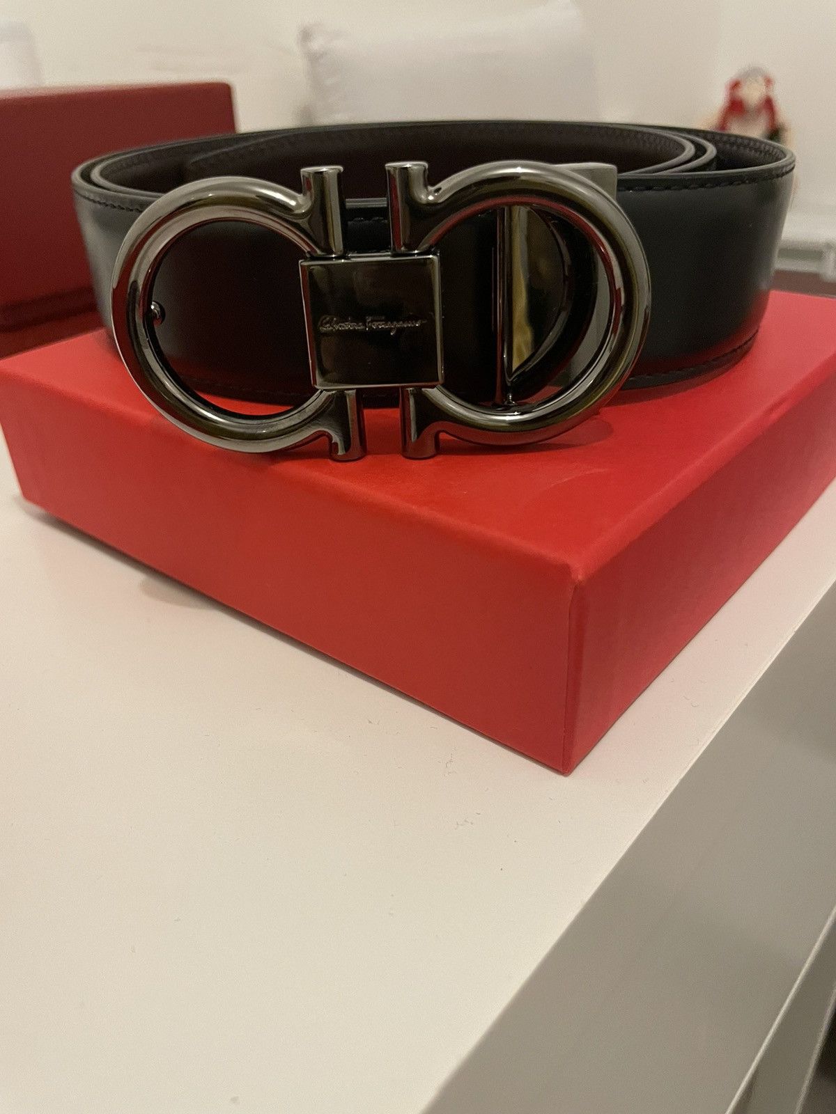 image of Salvatore Ferragamo Ferragamo Gancini Buckle Belt in Black, Men's