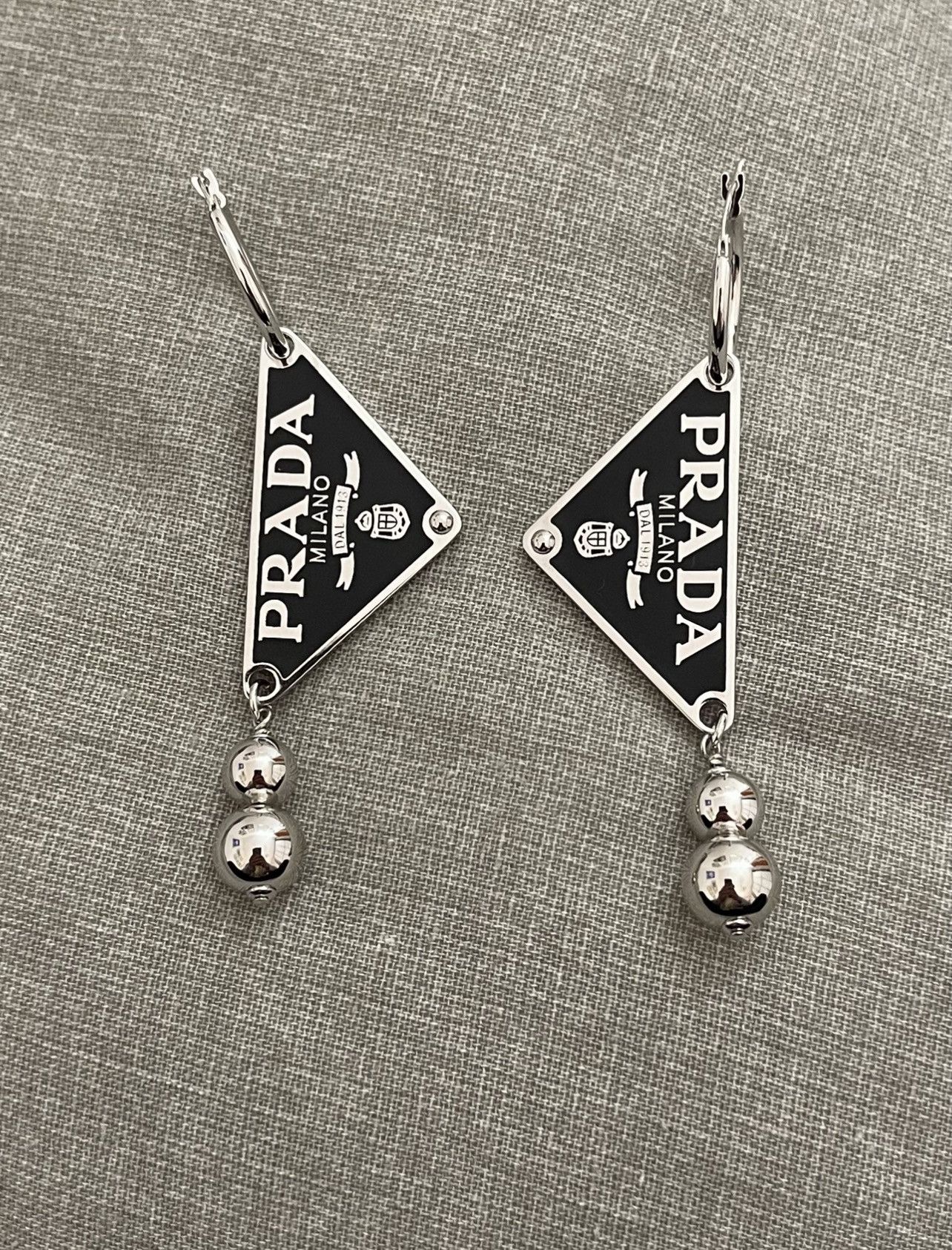 Prada Prada Symbole Large Trinagle Logo Hoop Earrings in Silver Grailed