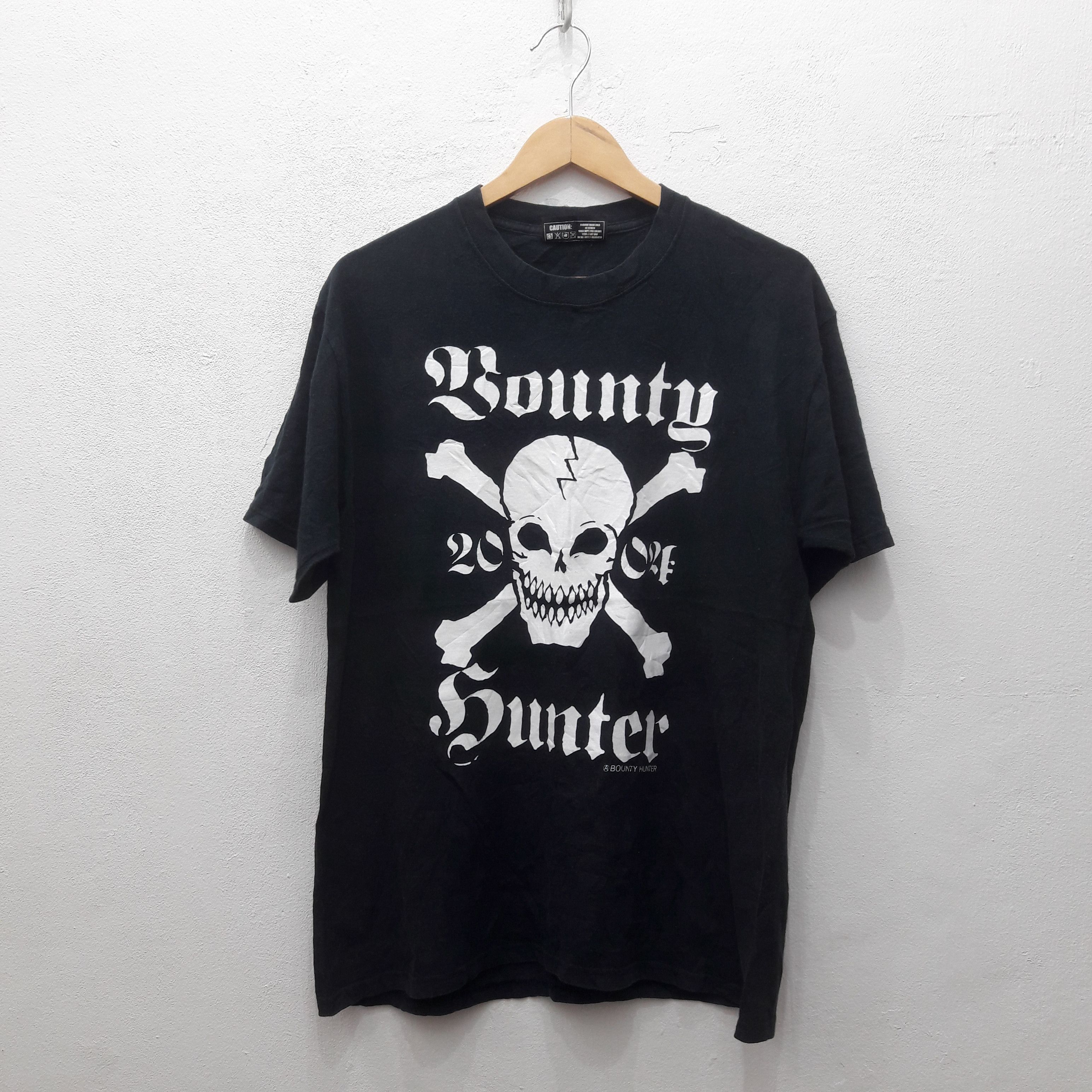 image of Archival Clothing x Bounty Hunter Vintage Bounty Hunter Skull Iconic Big Logo Tshirt (Size Large)
