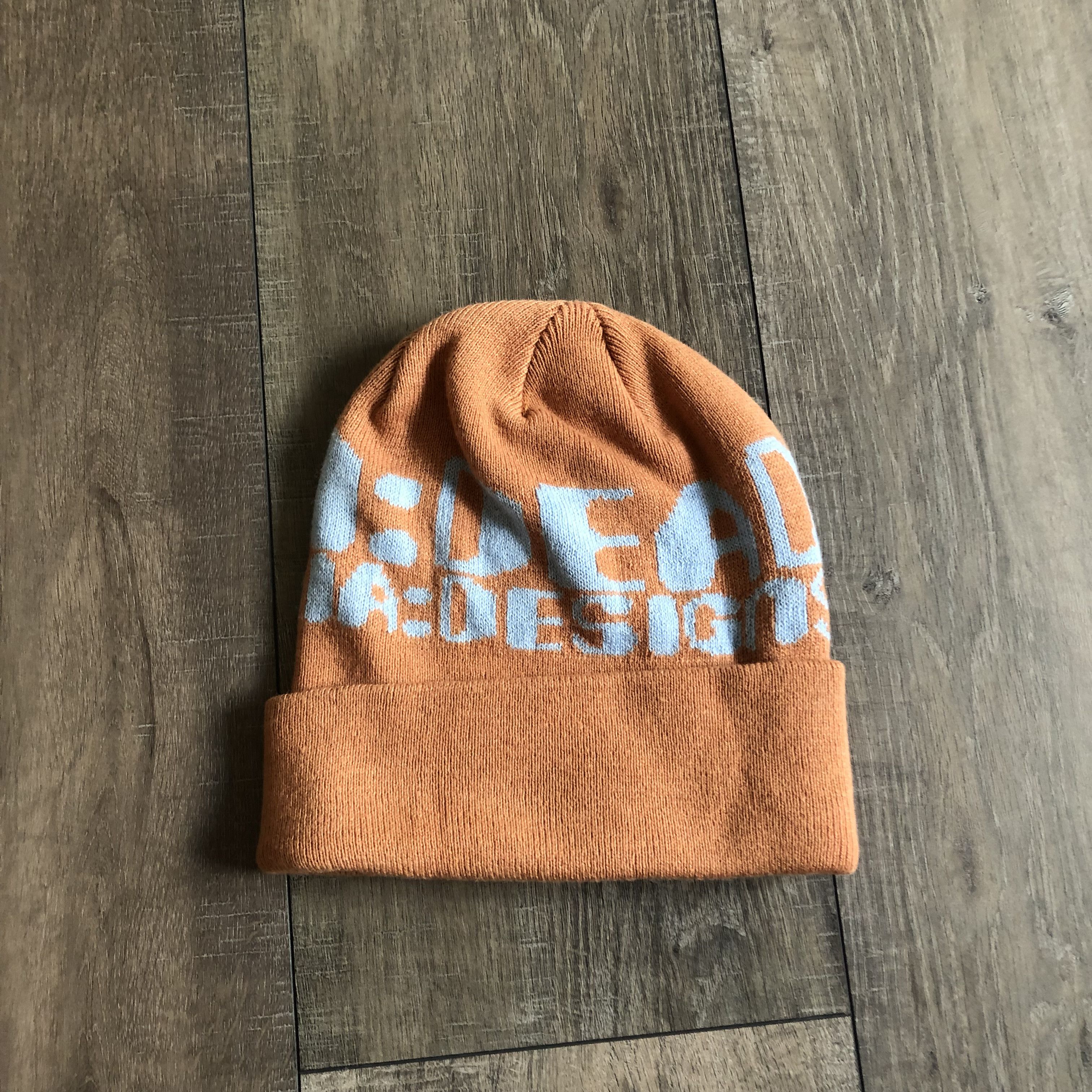 image of Brain Dead Logo Beanie in Burnt Orange, Men's