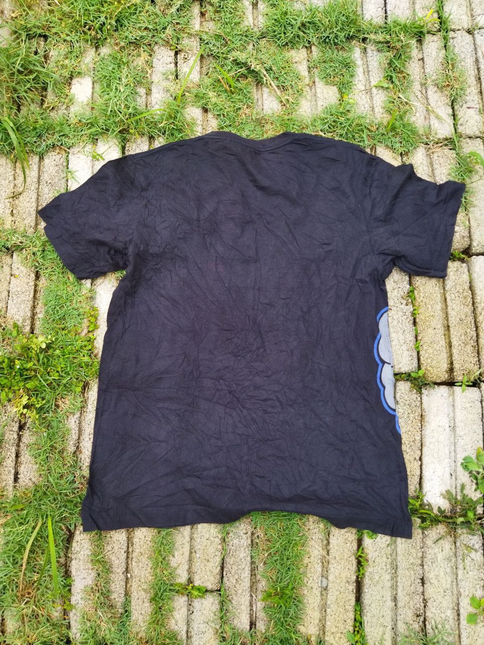 Kaws × Uniqlo Kaws X Uniqlo Tees Size US L / EU 52-54 / 3 - 7 Thumbnail