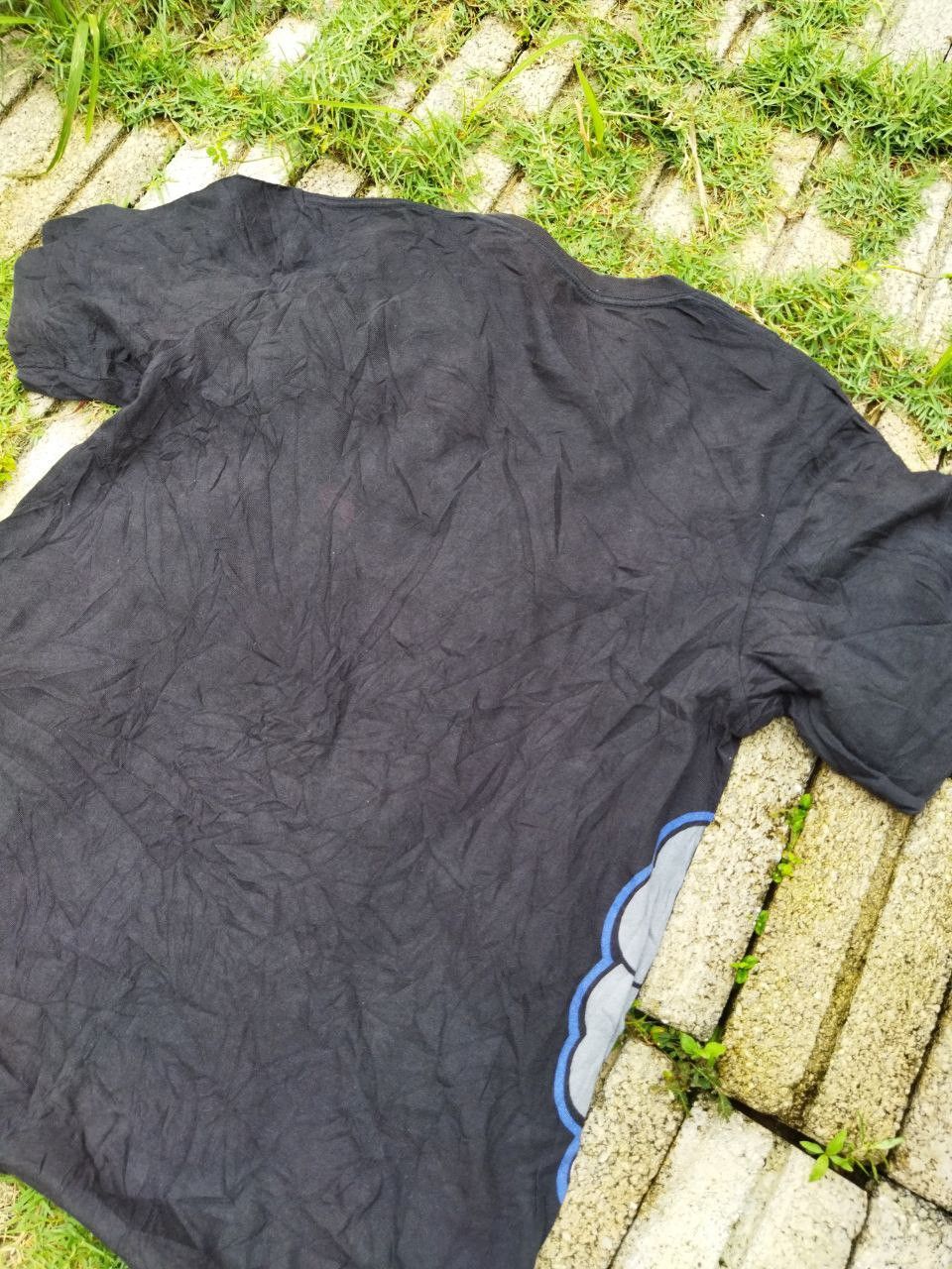 Kaws × Uniqlo Kaws X Uniqlo Tees Size US L / EU 52-54 / 3 - 8 Thumbnail