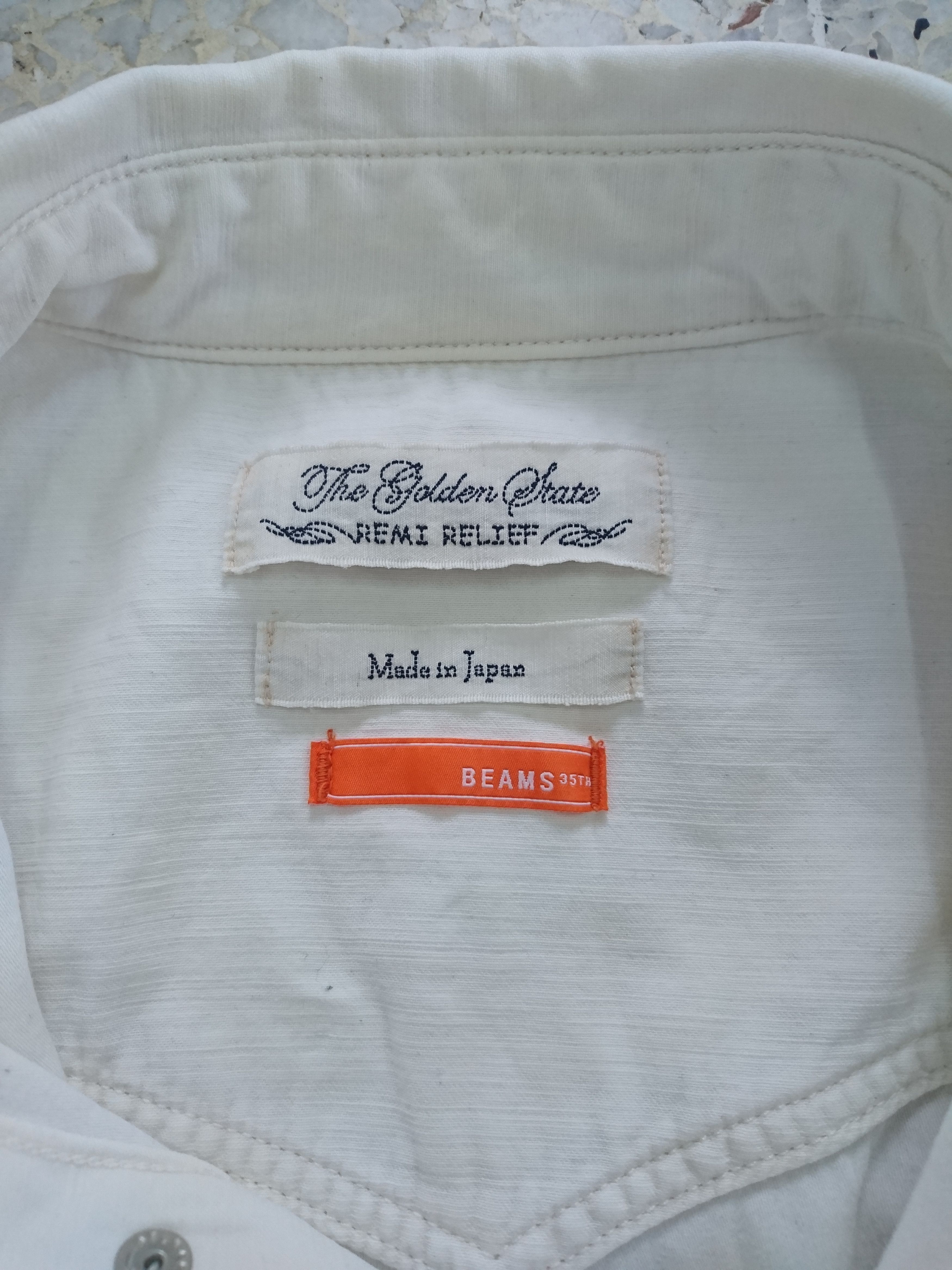 Beams Plus × Remi Relief RARE Remi Relief x Beams 35th snap button Size US S / EU 44-46 / 1 - 6 Thumbnail