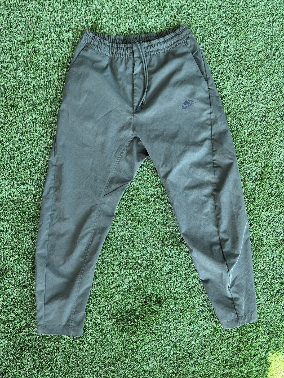 olive green nike tech shorts