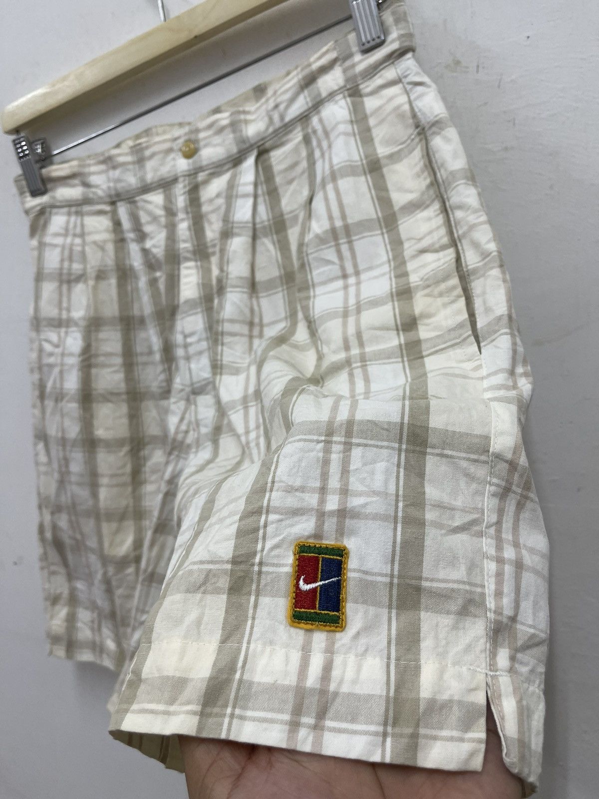 Nike plaid tennis shorts sales