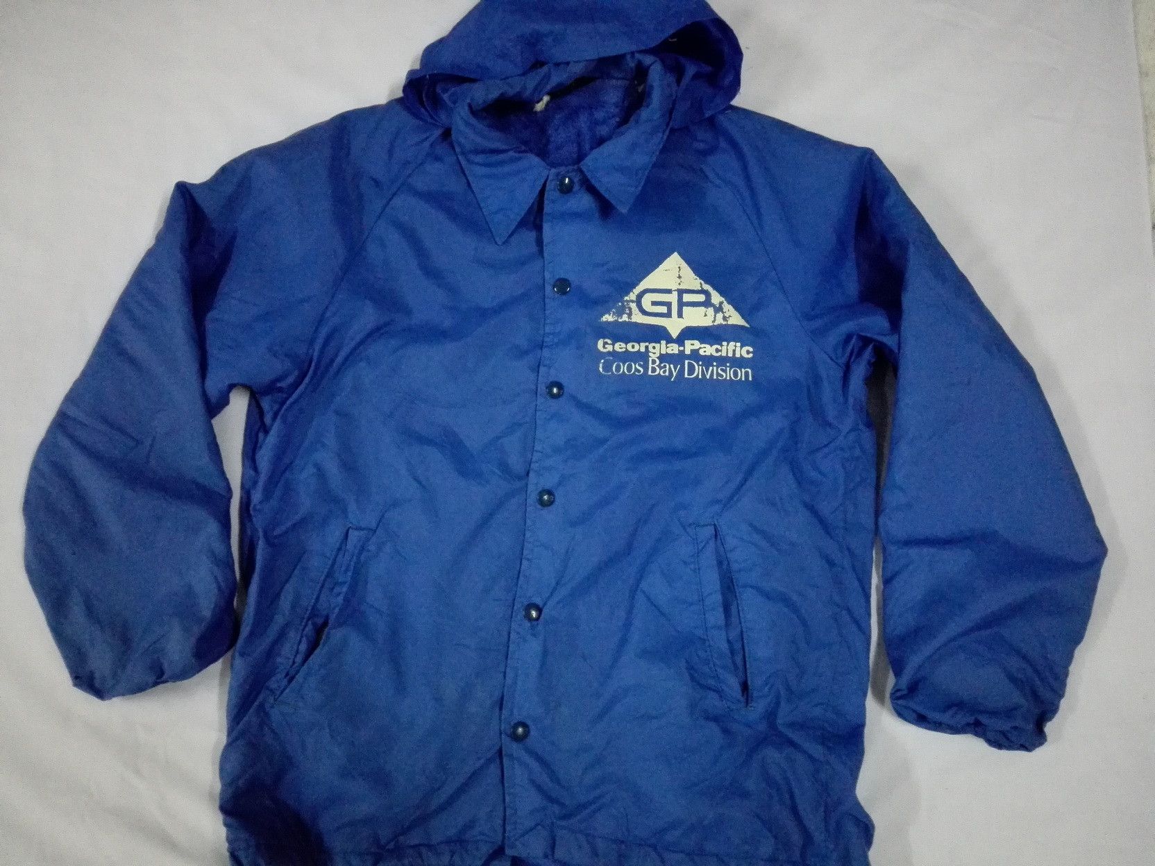 image of 80's Champion Running Man Georgia Pacific Jacket in Blue, Men's (Size Large)