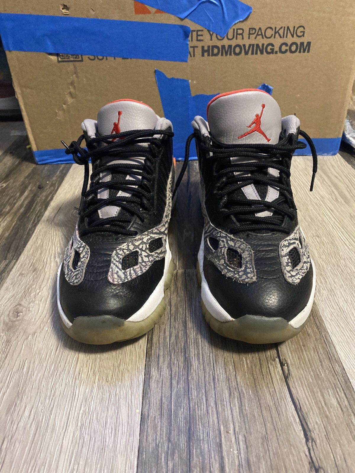 jordan 11 low black cement