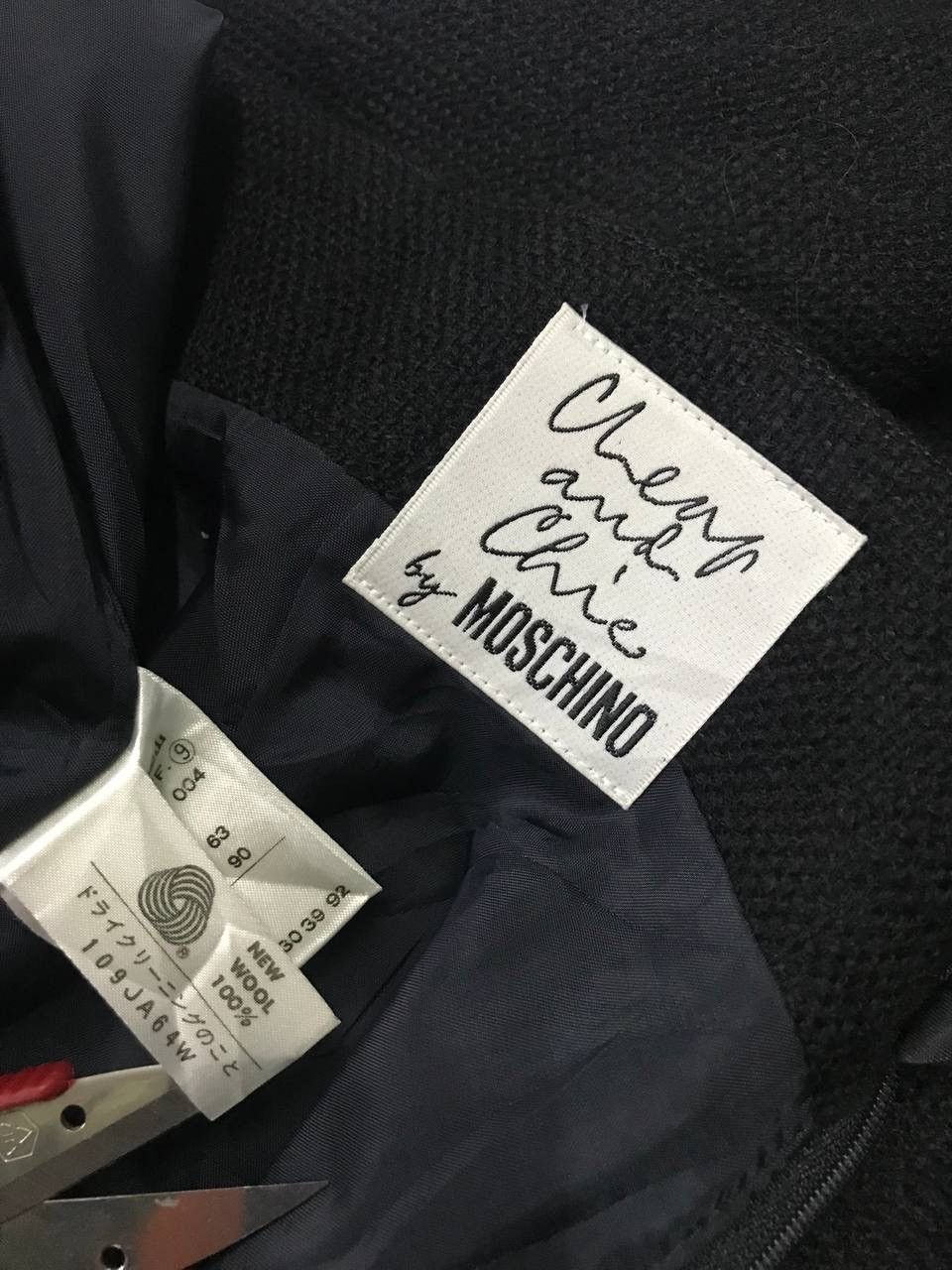 The black Cheap & Chic by Moschino mini skirt