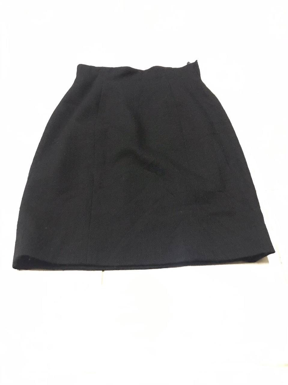 The black Cheap & Chic by Moschino mini skirt
