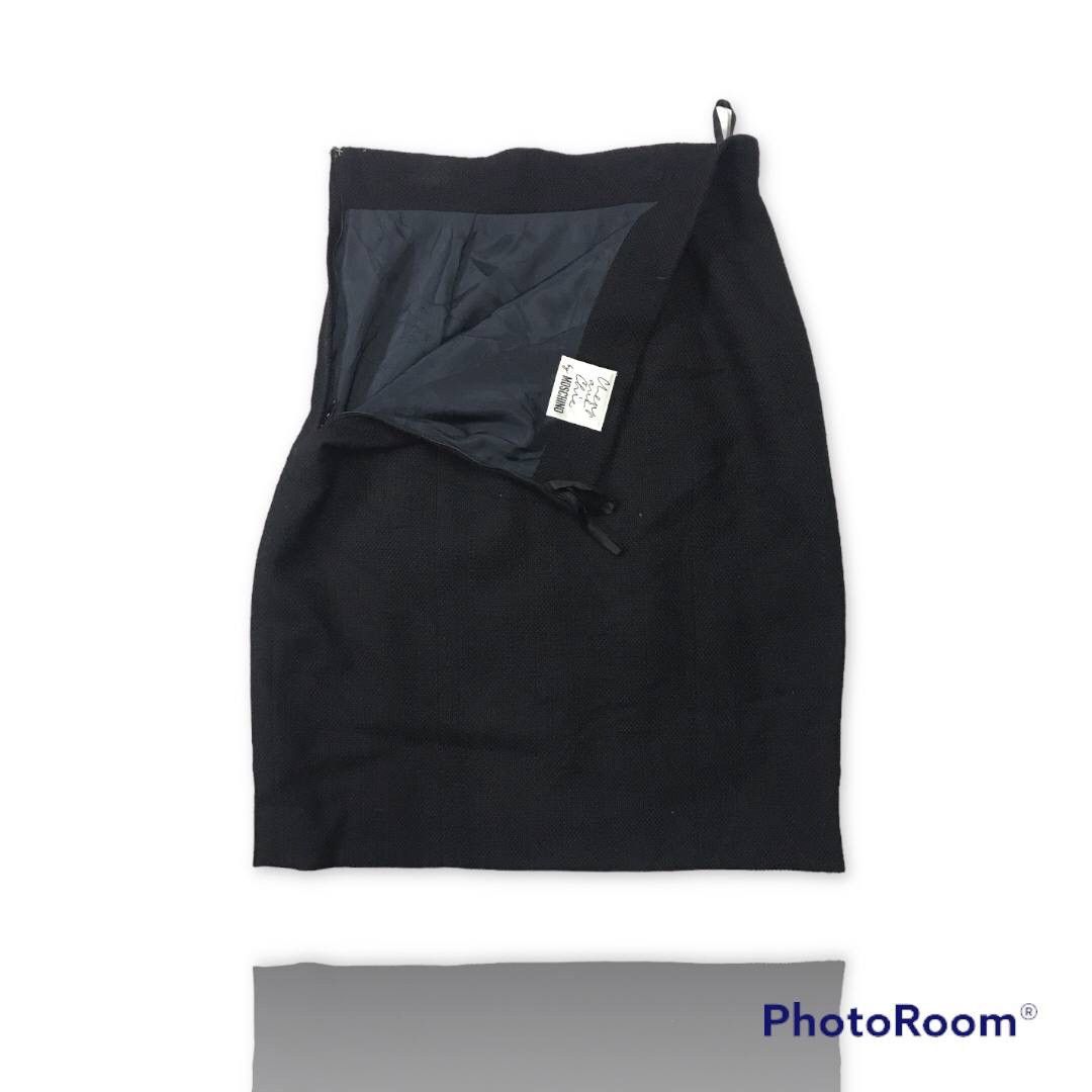 The black Cheap & Chic by Moschino mini skirt