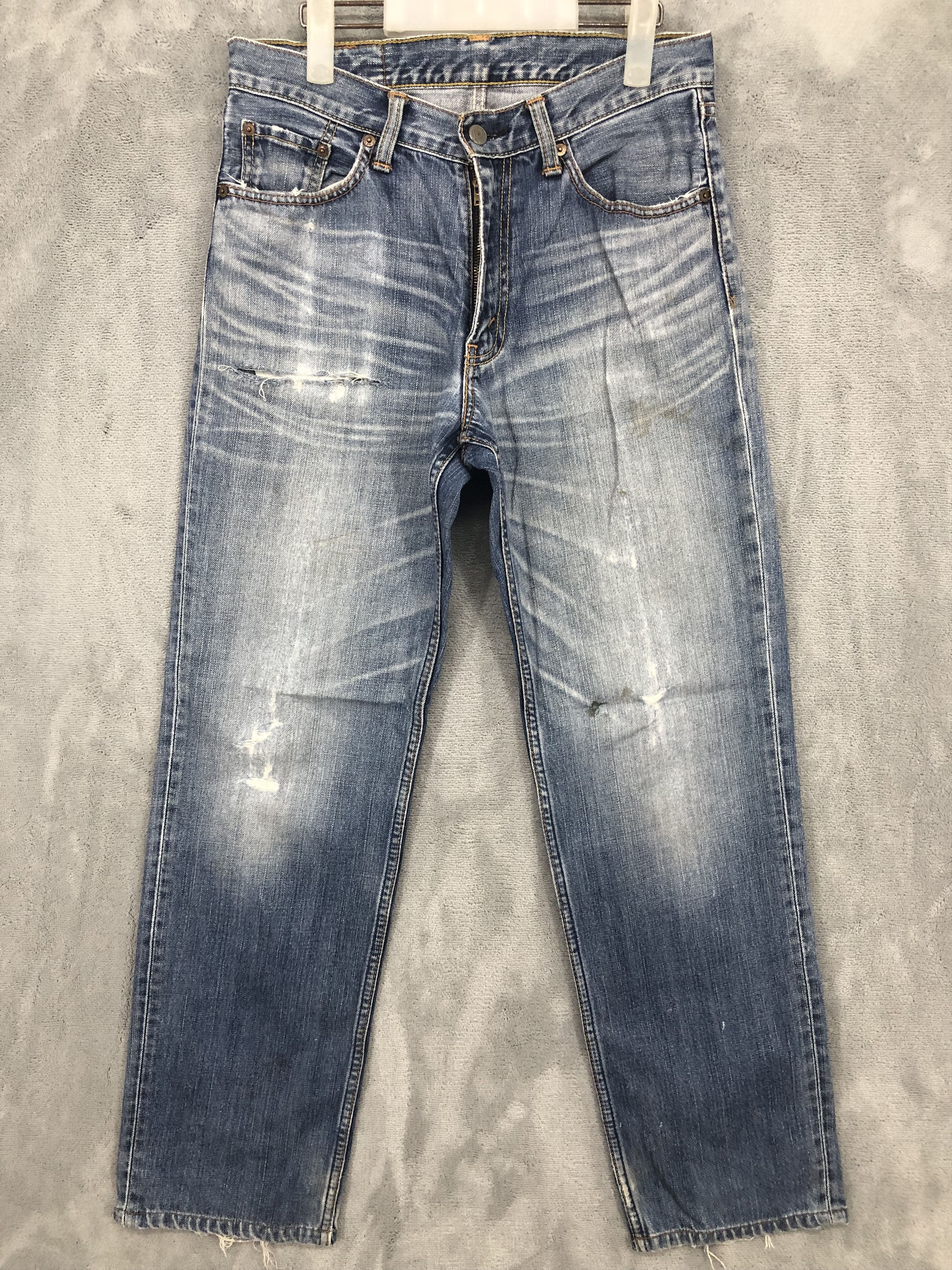image of Vintage Levis 702 Distressed Denim Jean in Blue, Men's (Size 29)