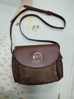 Nina ricci sling bag best sale