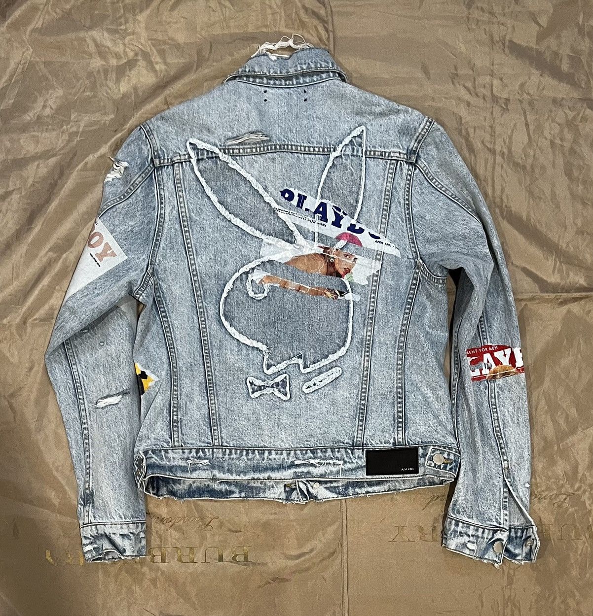 Amiri AMIRI x Playboy distressed-finish denim jacket size M $2800 Size US M / EU 48-50 / 2 - 11 Thumbnail