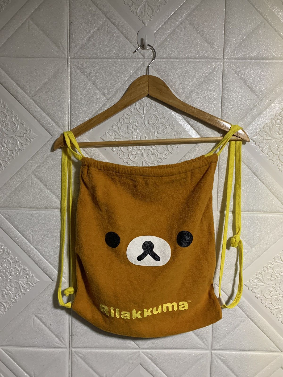 image of Anima Rilakkuma Drawstring Fleece Bag in Brown Orange, Men's