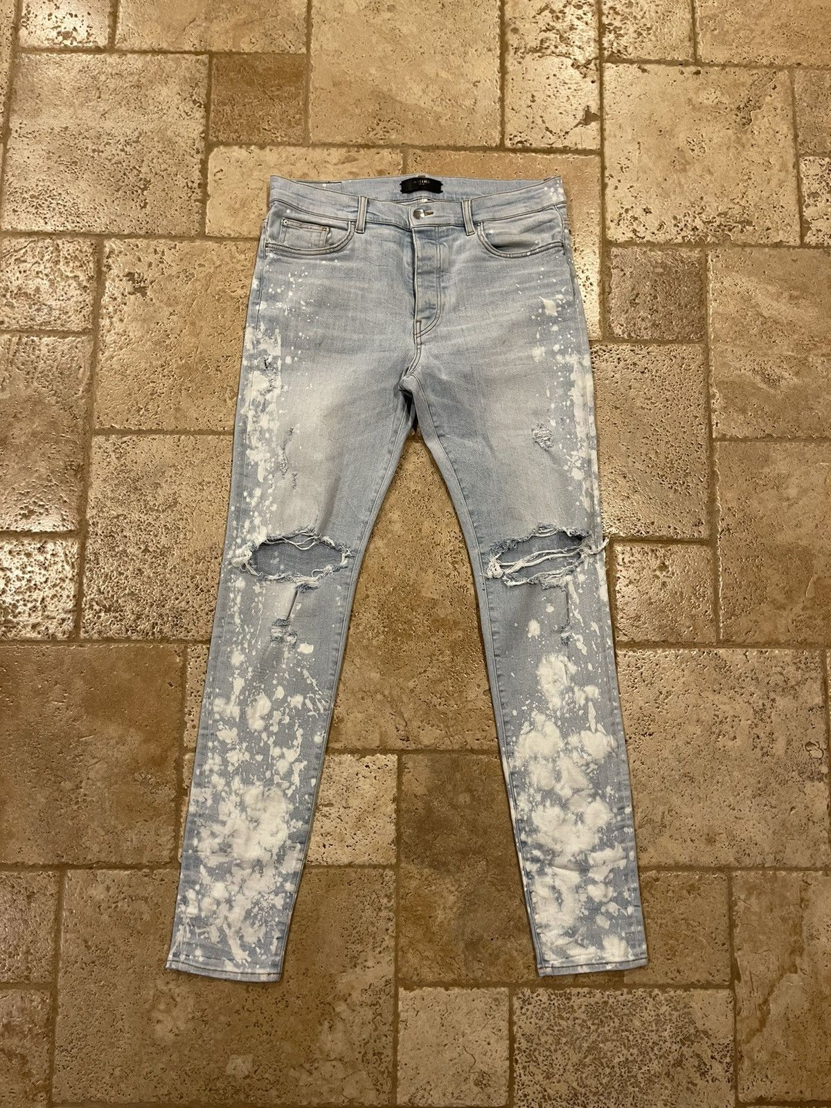 image of Amiri Bleached Splatter Light Wash Blue Thrasher Denim Jeans, Men's (Size 36)