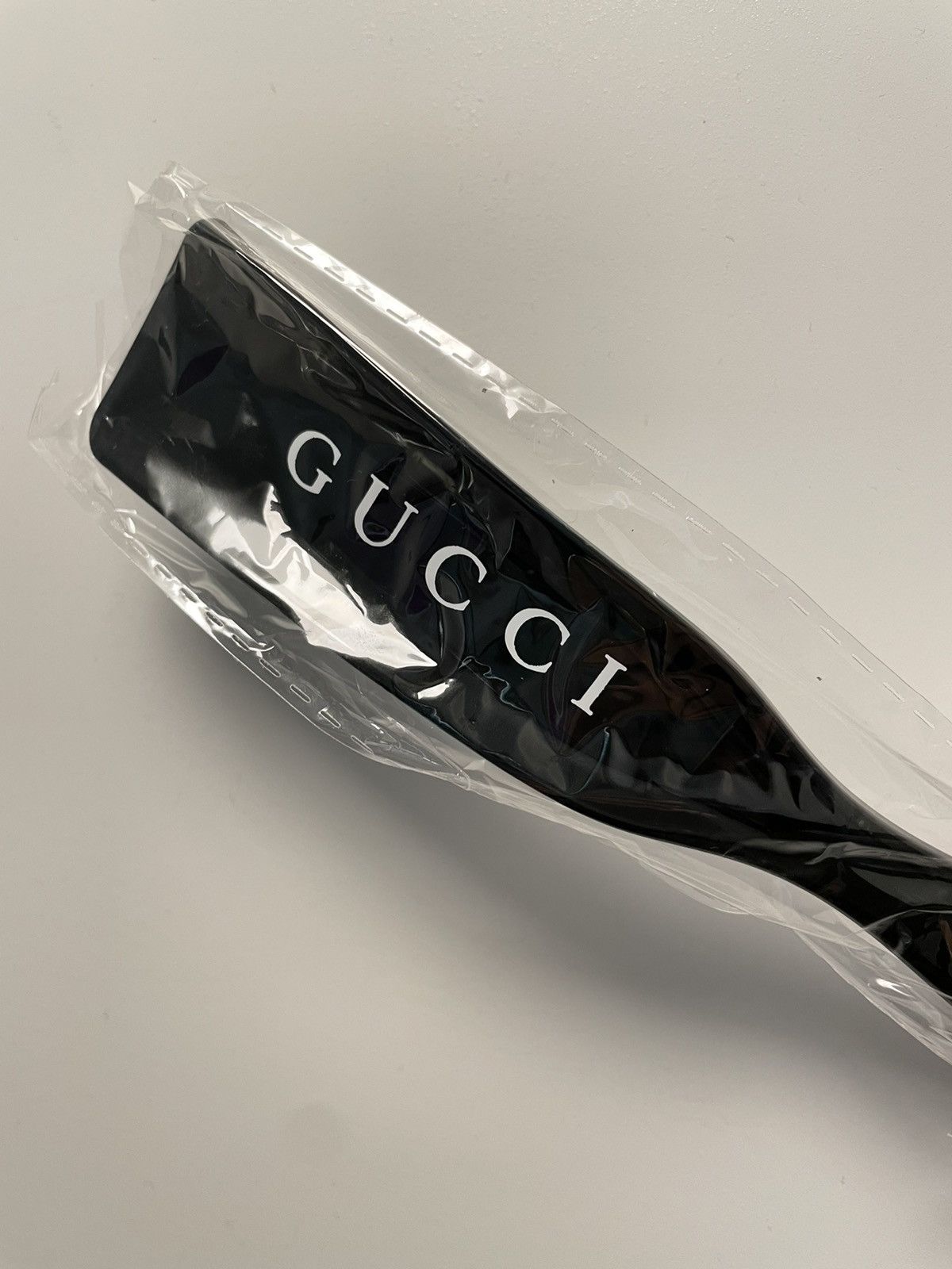 image of Gucci Shoe Horn in Black, Men's