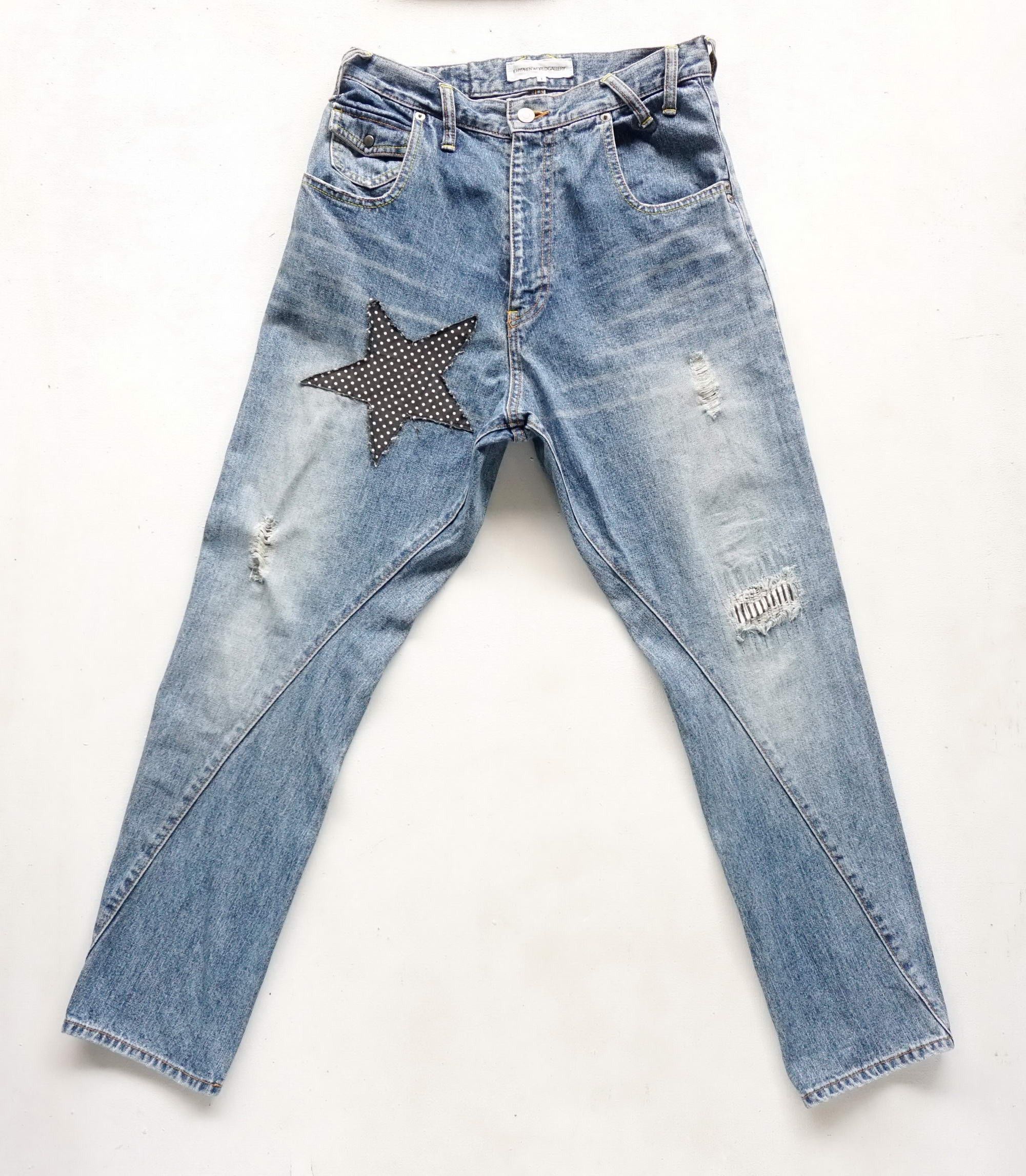 image of Ehyphen World Gallery Distressed & Patched High Waist Jeans in Blue, Women's (Size 26)