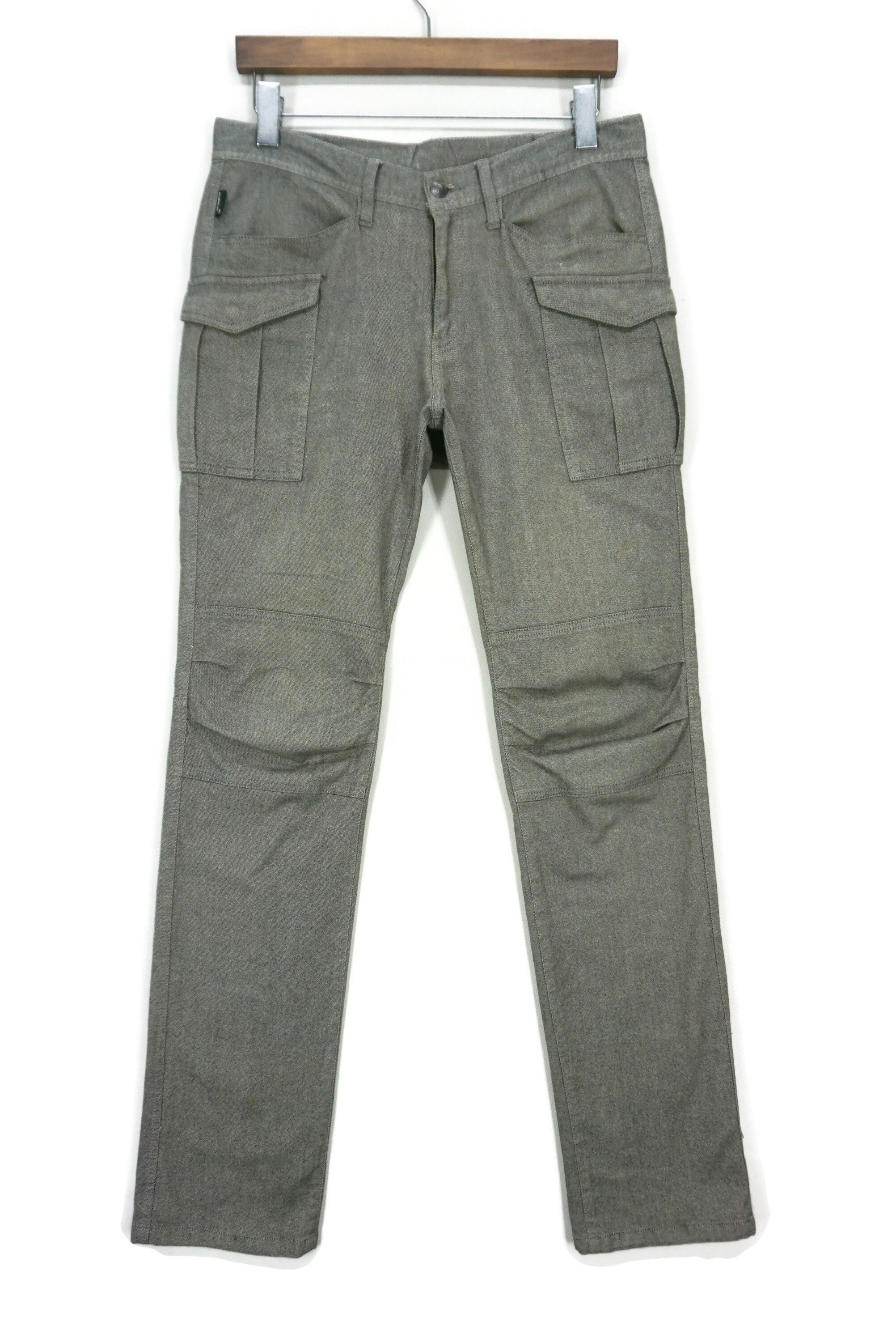 image of Surplus x Takeo Kikuchi Low Rise Tactical Cargo Multi Pocket Articulated Knees in Black (Size 32)