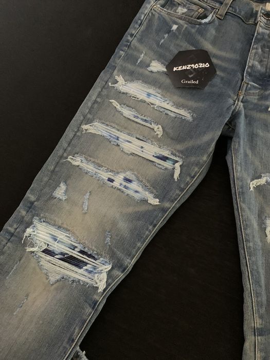 Jean skinny à patchwork bleu clair Amiri, €1.283