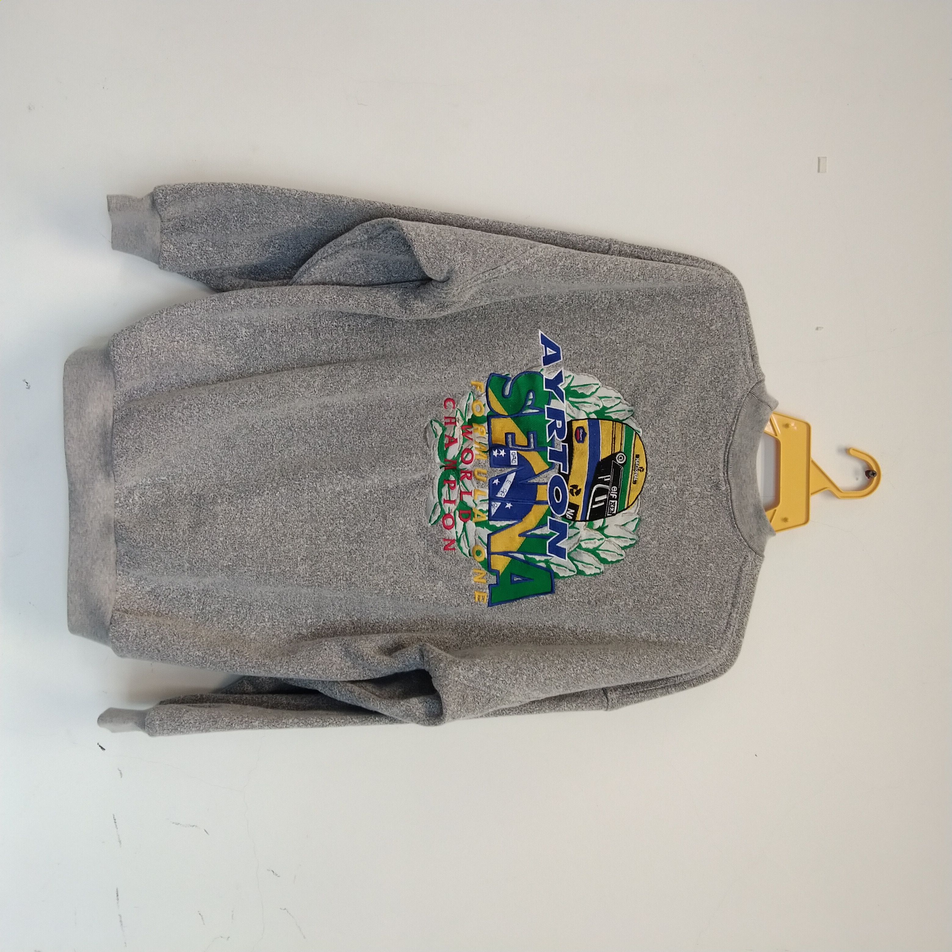 image of Formula Uno x Racing Vintage Ayrton Senna Formula One World Champion in Grey, Men's (Size Large)