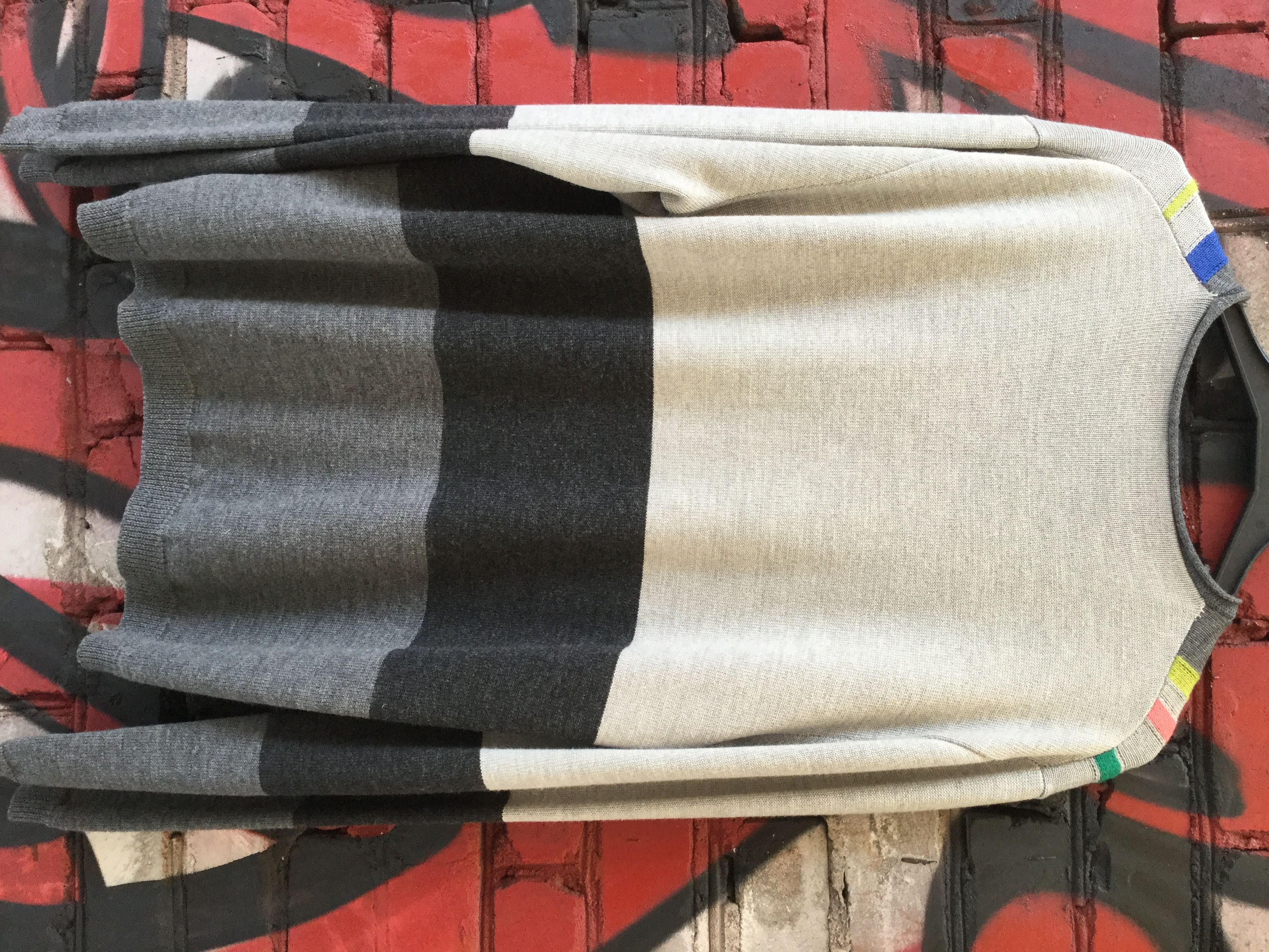 Asymmetrical wool sweater.Like Marni or Kenzo