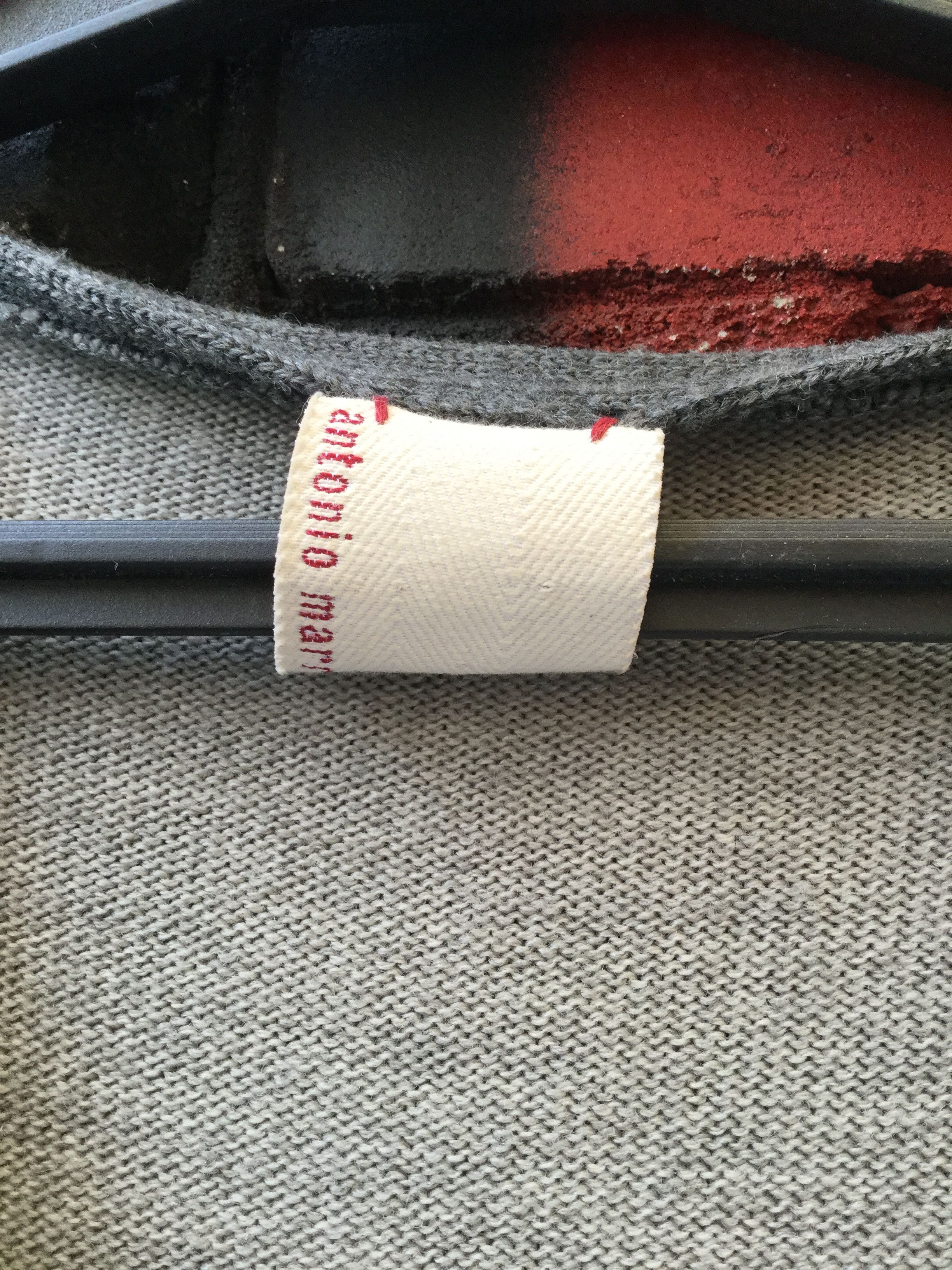 Asymmetrical wool sweater.Like Marni or Kenzo