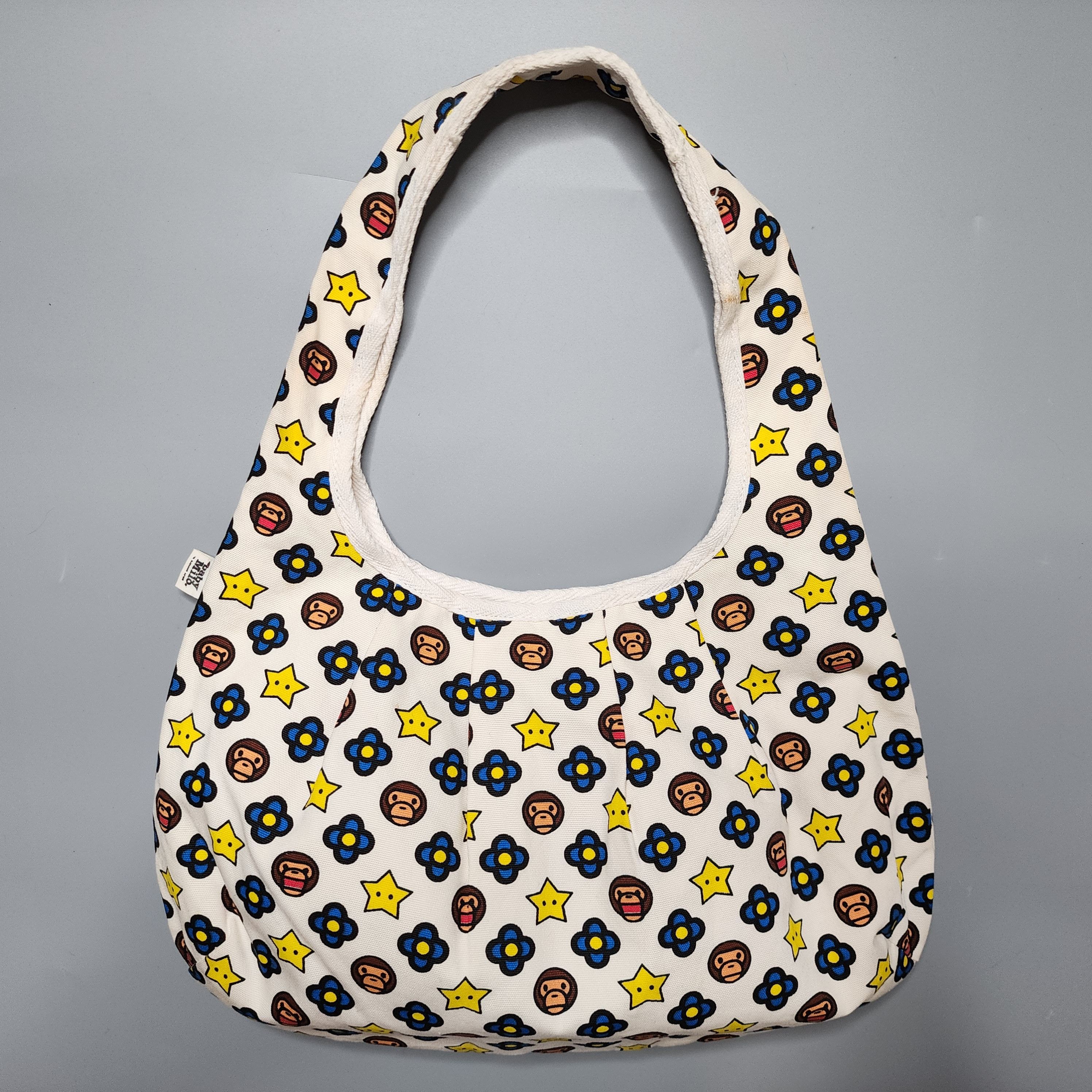 image of Bape X Baby Lisa - Y2K Milo Monogram Hobo Bag in White, Women's