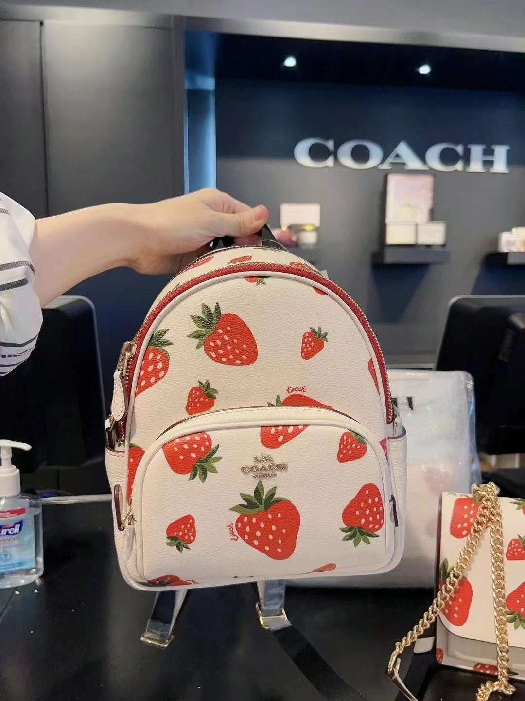 GENUINE Disney X Coach Mini Court Backpack With Cruella Motif