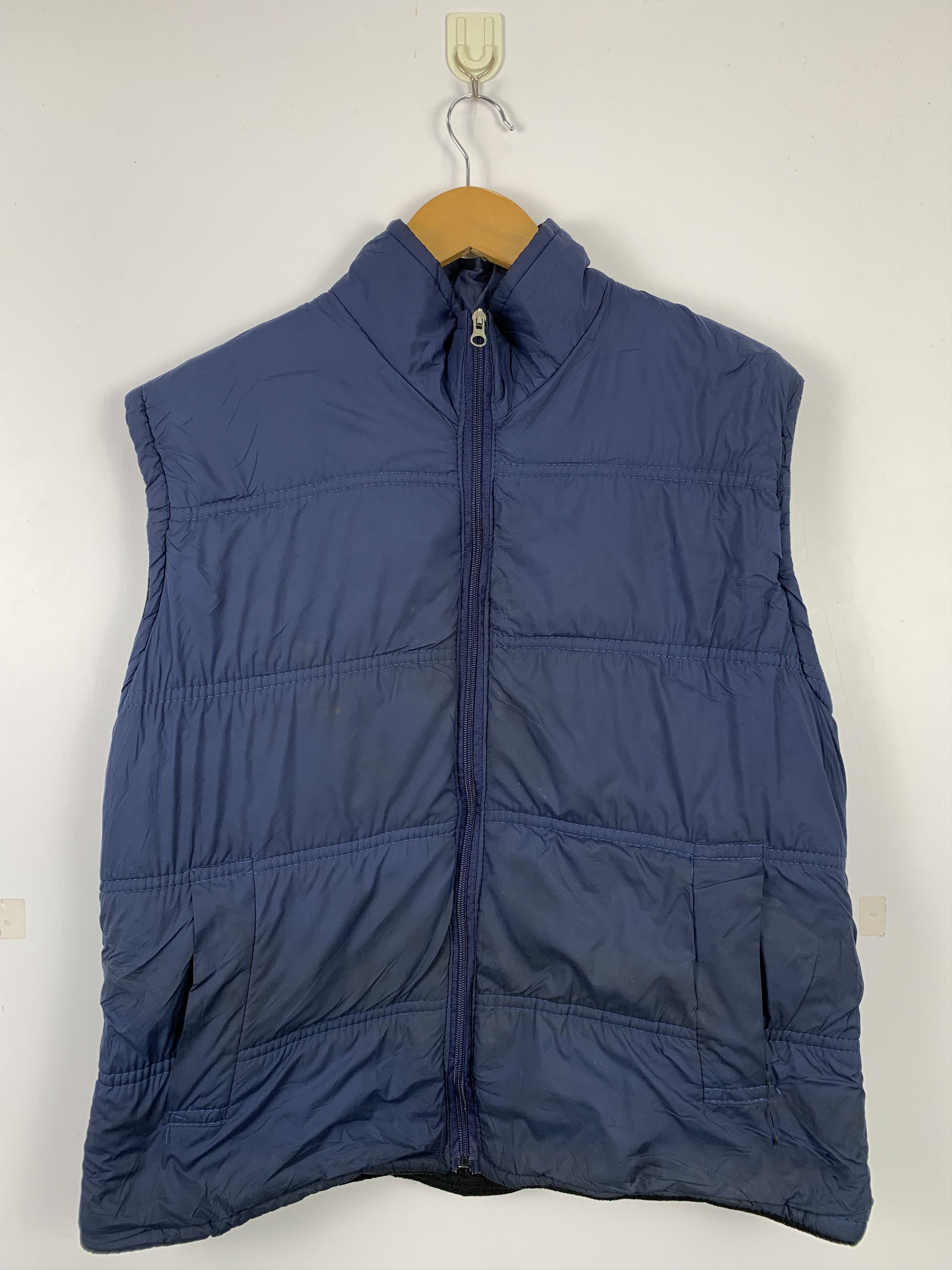 image of Vintage Puffer Zip Up Fleece Lining Vests in Dark Blue Sun Faded, Men's (Size Small)