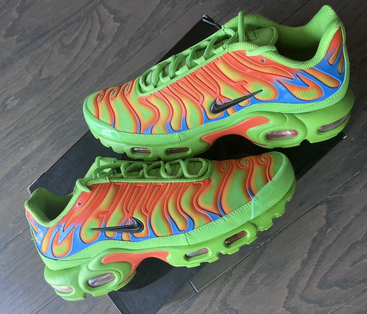 image of Nike Air Max Plus Tn Shoes in Green, Men's (Size 10)