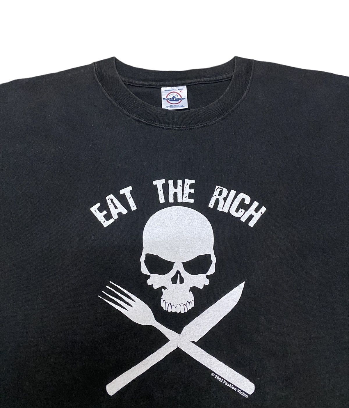 image of Archival Clothing x Fashion Victim Vintage Sunfaded Fashion Victim “Eat The Rich” Punk Tee in Black