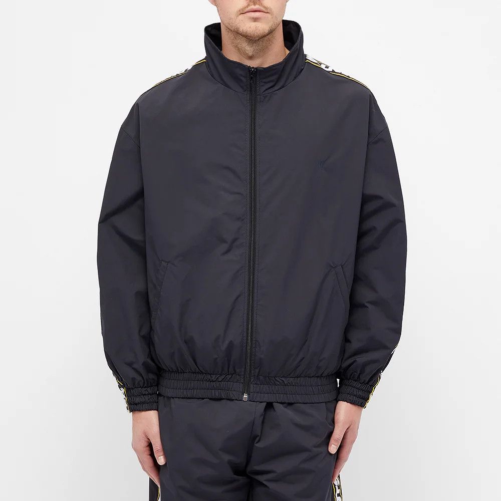 Vetements $1530 VETEMENTS black logo tape zip up track jacket  