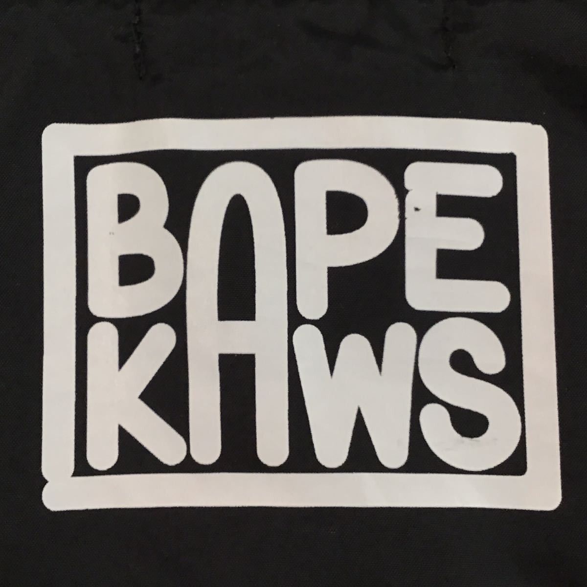 Bape × Kaws BAPE × KAWS milo nylon coach jacket black × gray Size US XL / EU 56 / 4 - 4 Thumbnail