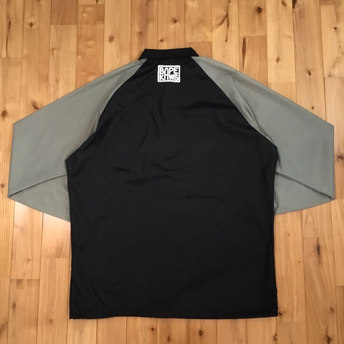 Bape × Kaws BAPE × KAWS milo nylon coach jacket black × gray Size US XL / EU 56 / 4 - 3 Thumbnail