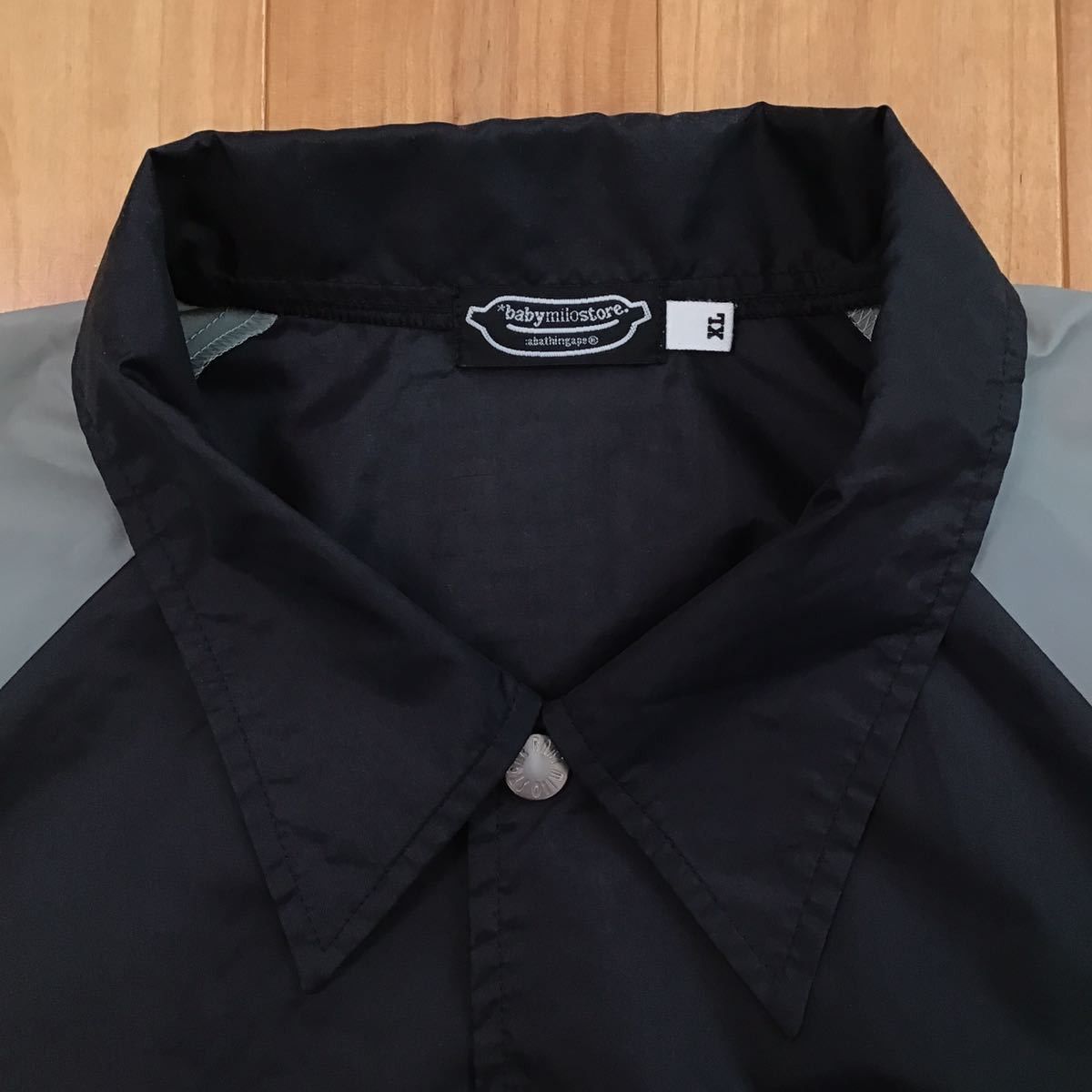 Bape × Kaws BAPE × KAWS milo nylon coach jacket black × gray Size US XL / EU 56 / 4 - 6 Thumbnail