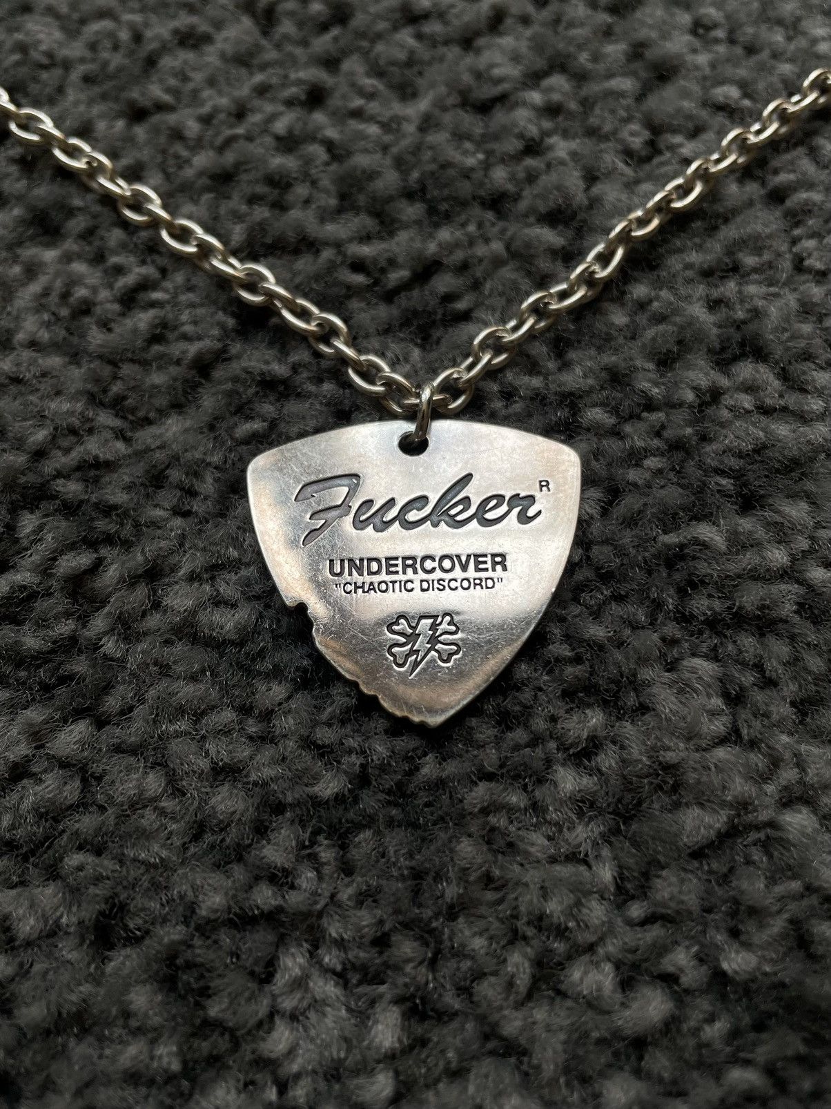 image of Undercover 2001Ss “Chaotic Discord” Fucker Pick Necklace in Silver, Men's