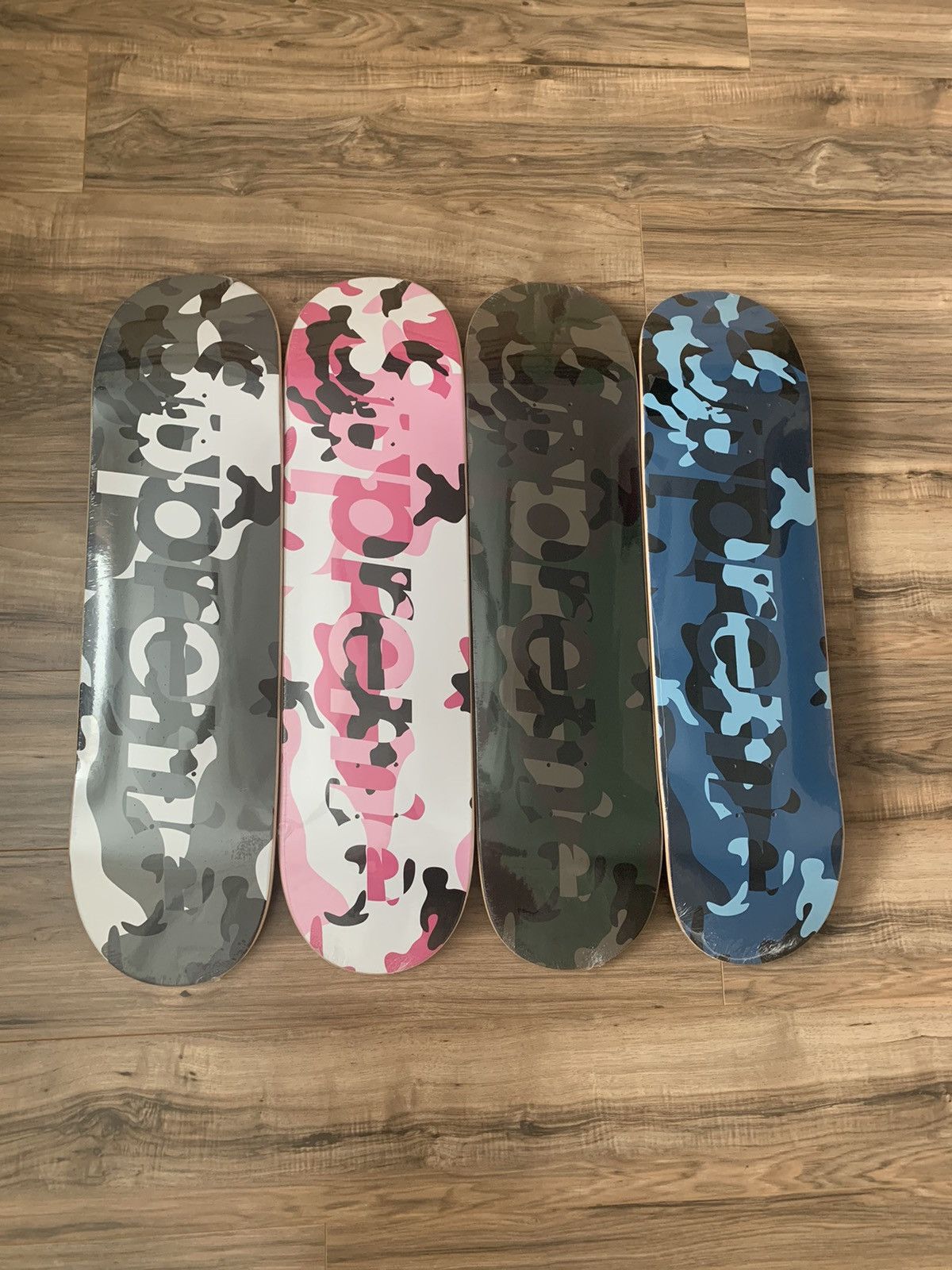 Supreme camo logo store skateboard