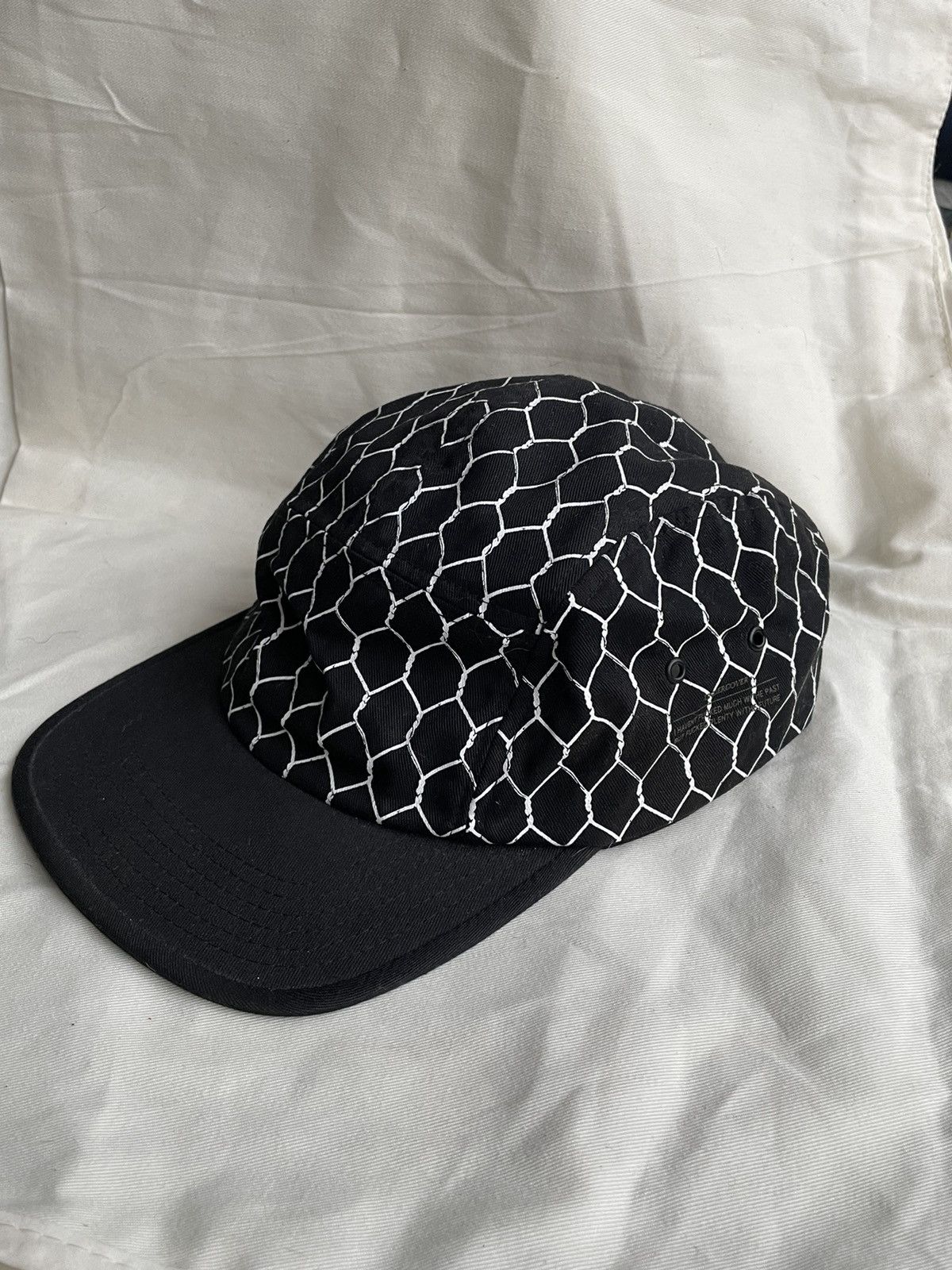 image of Undercover Caps in Black, Men's