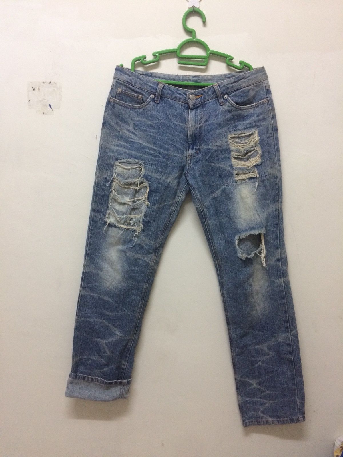 Vintage Faded Black Jeans with Distressed Wash Effect