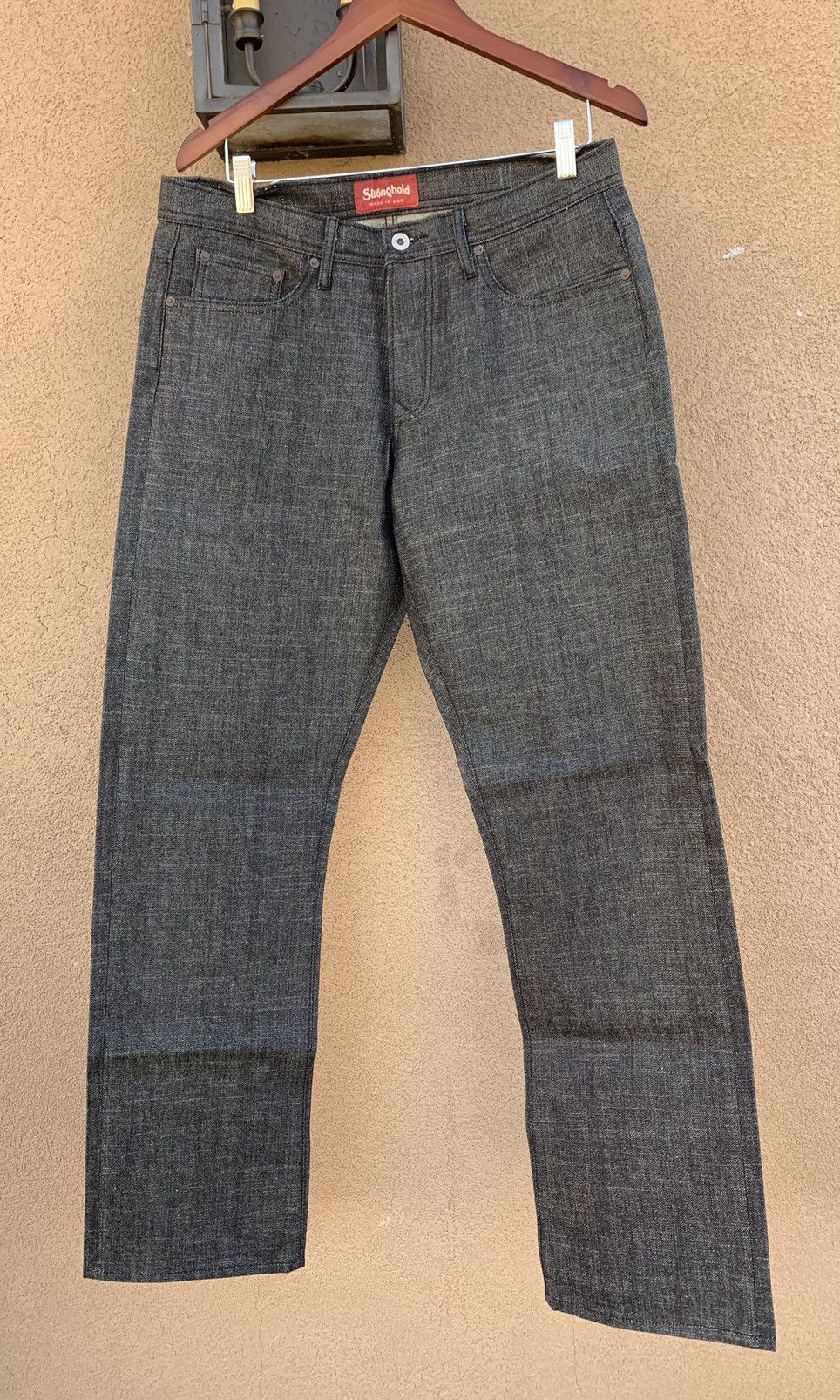 the stronghold 10.5oz straight black selvedge denim tag 33
