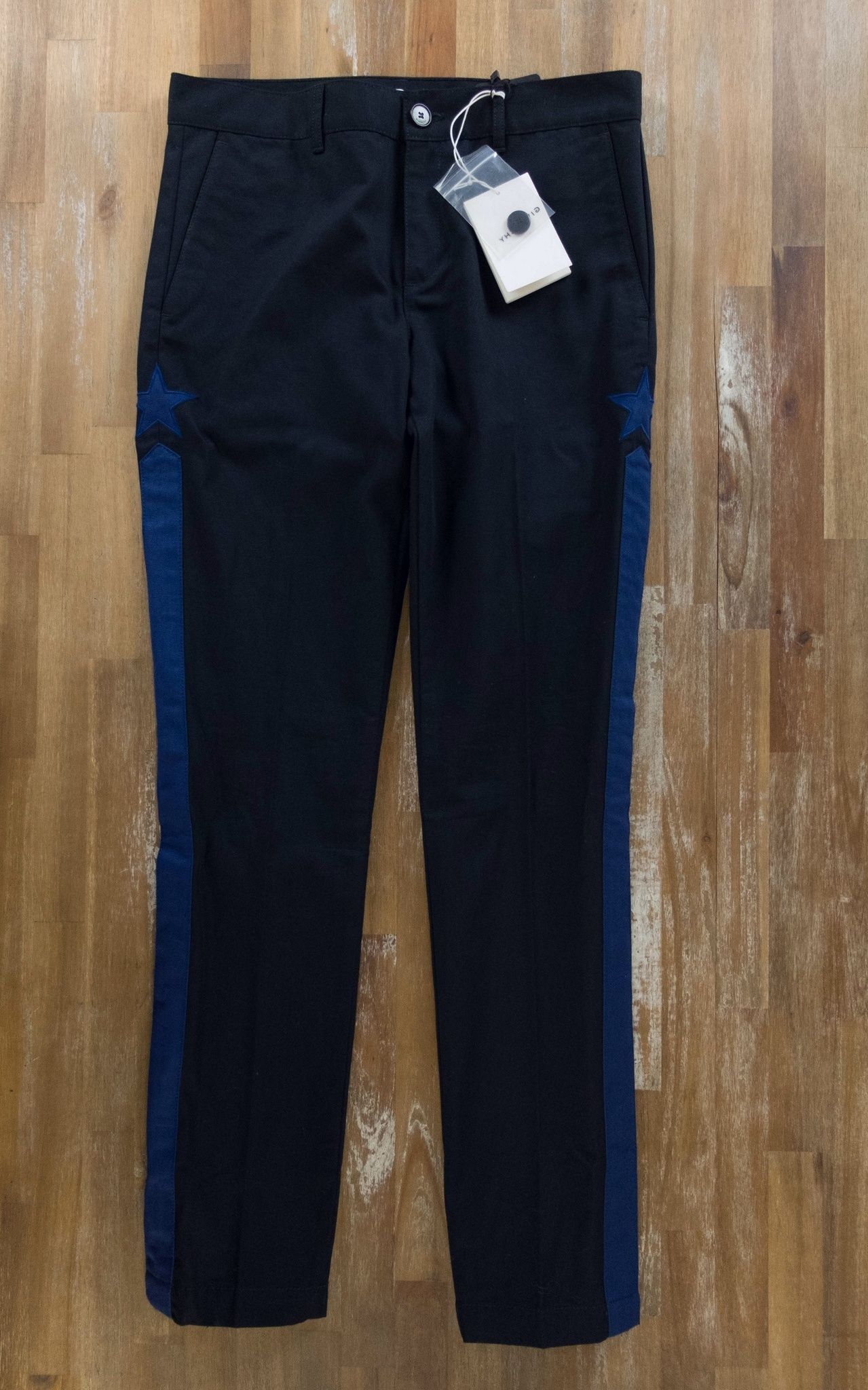 Givenchy GIVENCHY Paris blue star embroidered black cotton trousers ...