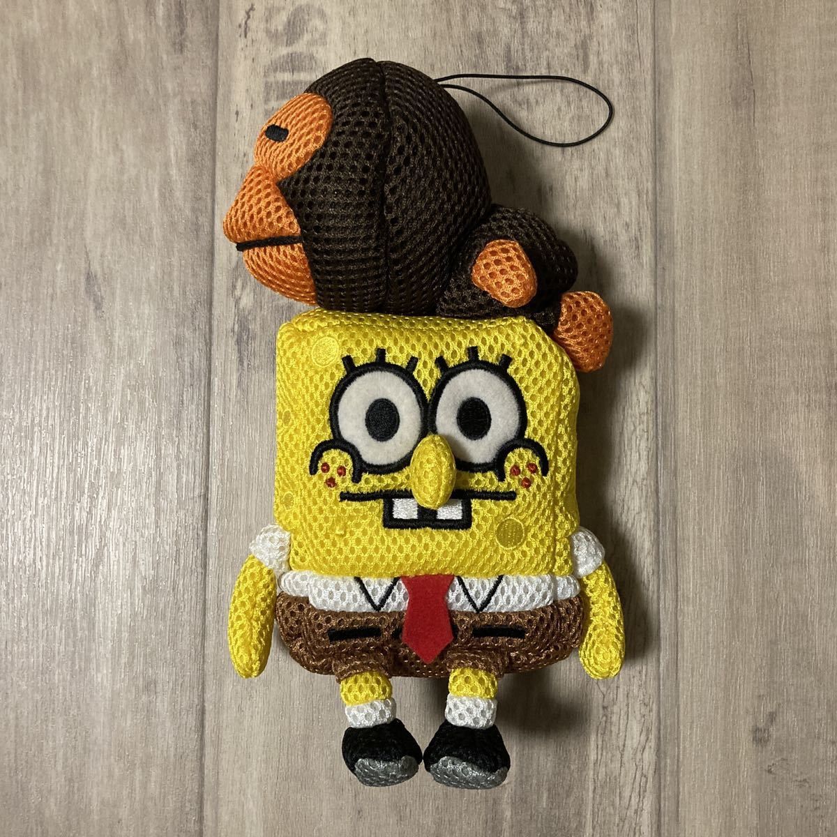 image of Bape × Spongebob Big Plush Doll Strap A Bathing Ape in Yellow, Men's