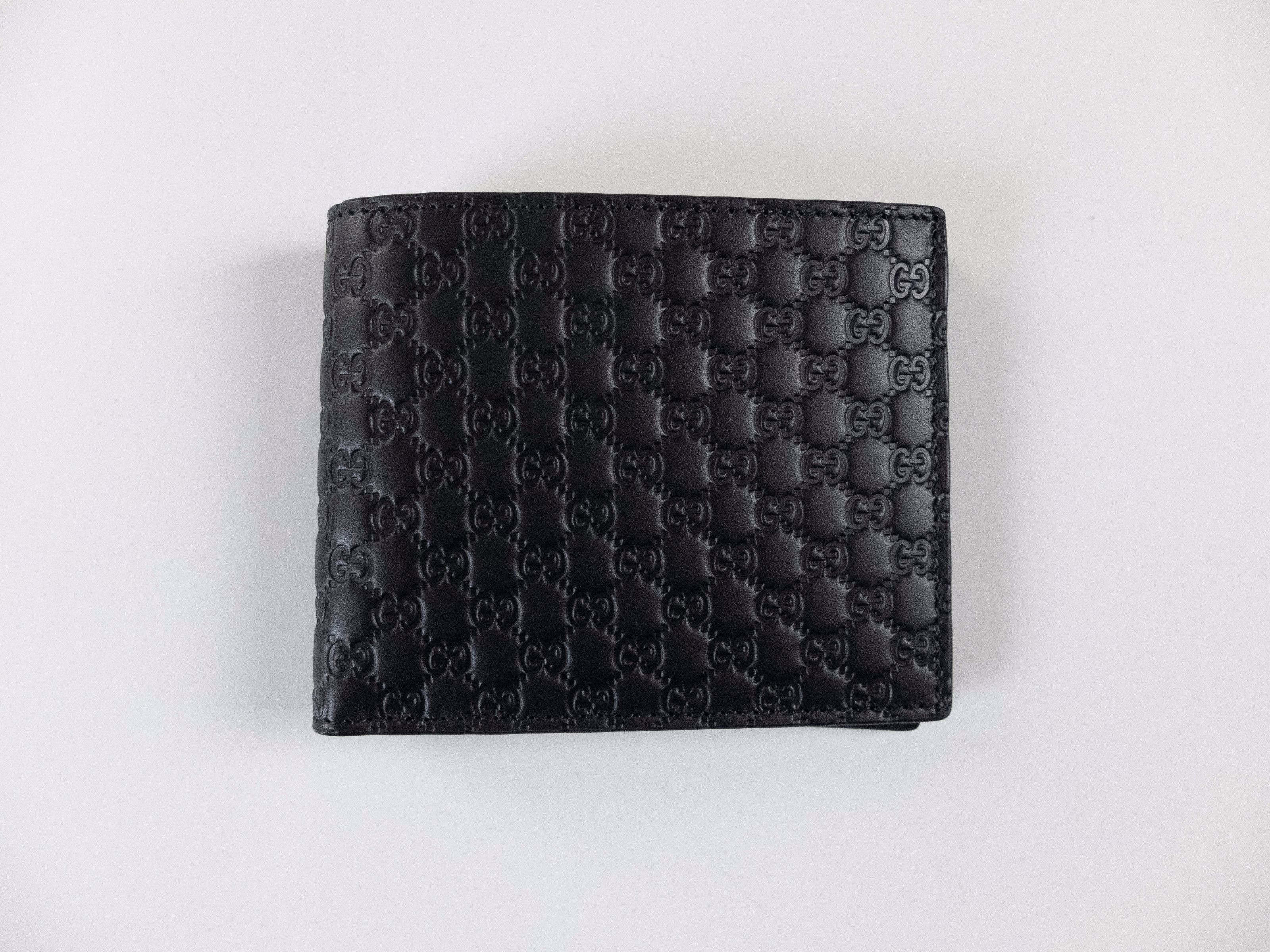 Gucci GUCCI navy blue GG Microguccissima leather bifold wallet